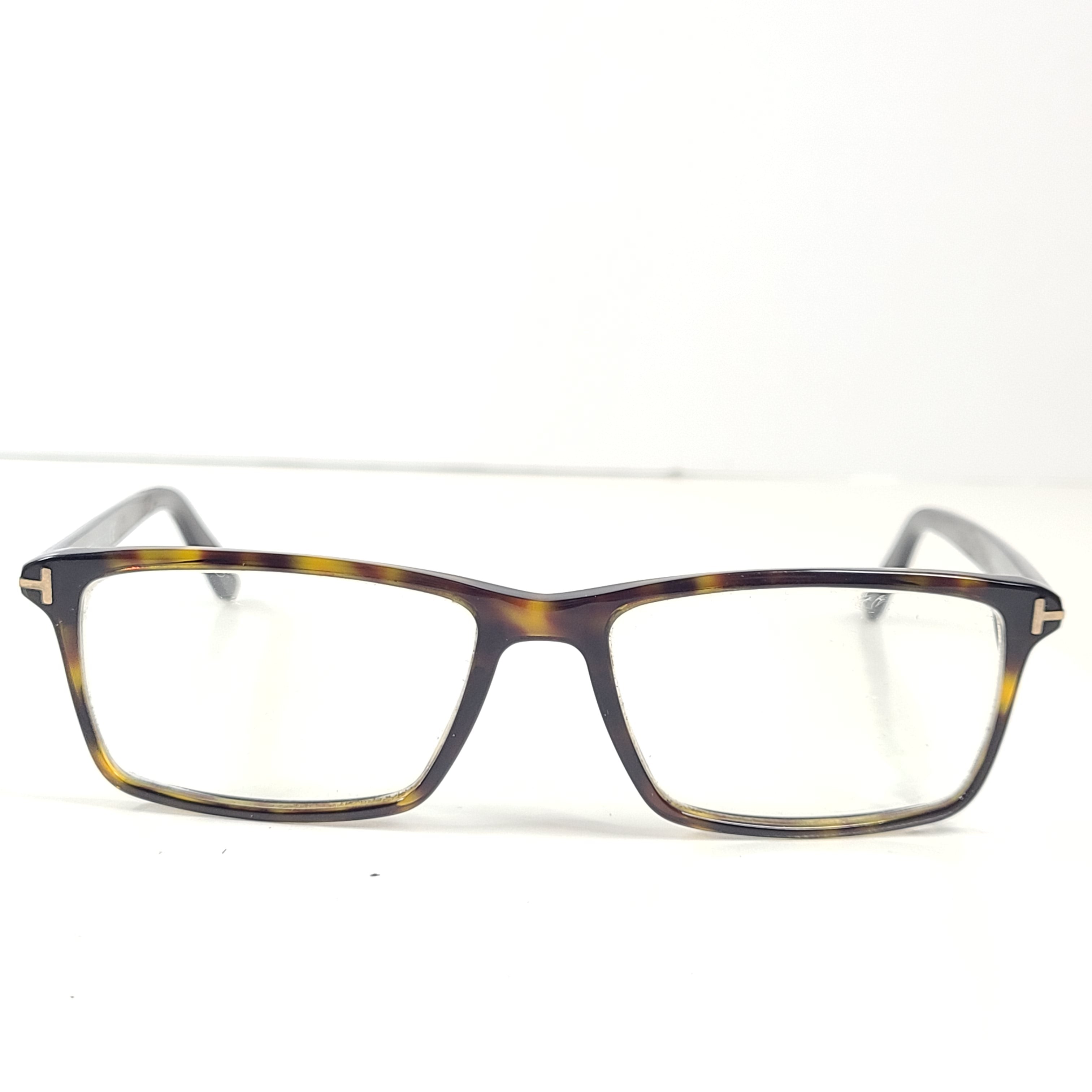 A stylish pair of men's Tom Ford eyeglasses with tortoise frames