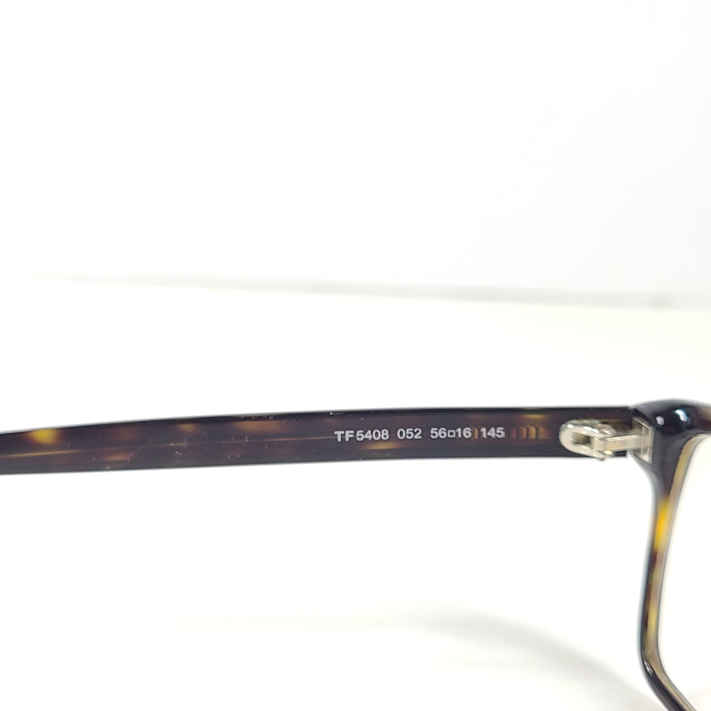 A stylish pair of men's Tom Ford eyeglasses with tortoise frames