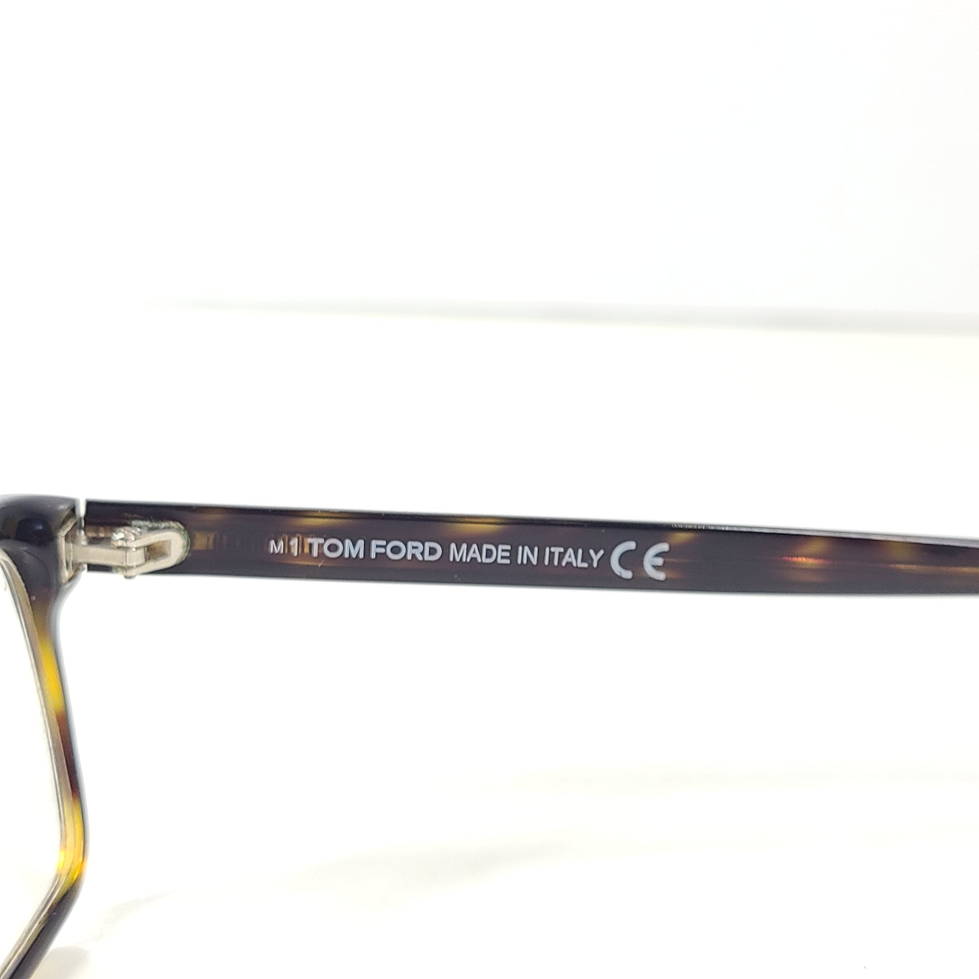 A stylish pair of men's Tom Ford eyeglasses with tortoise frames
