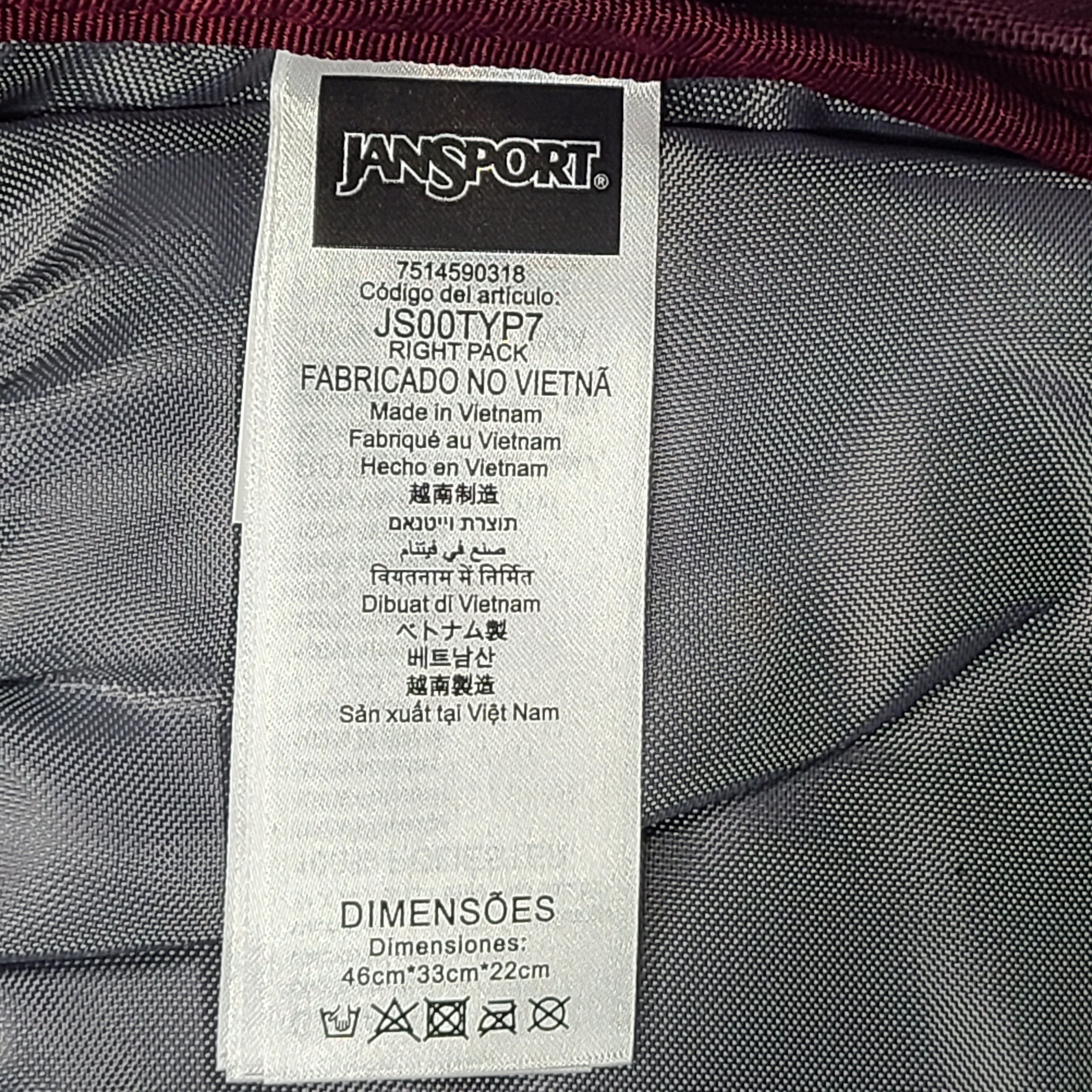 A maroon JanSport backpack with a 15" laptop sleeve.