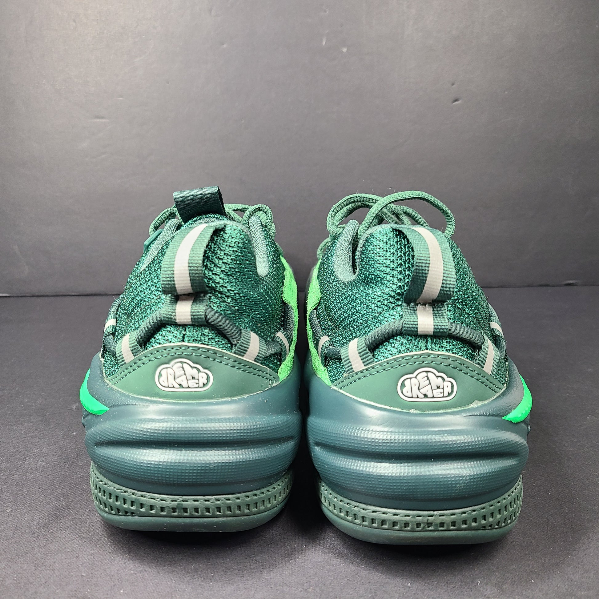 Stylish Puma Dreamer 2 J. Cole Basketball Shoes in green.
