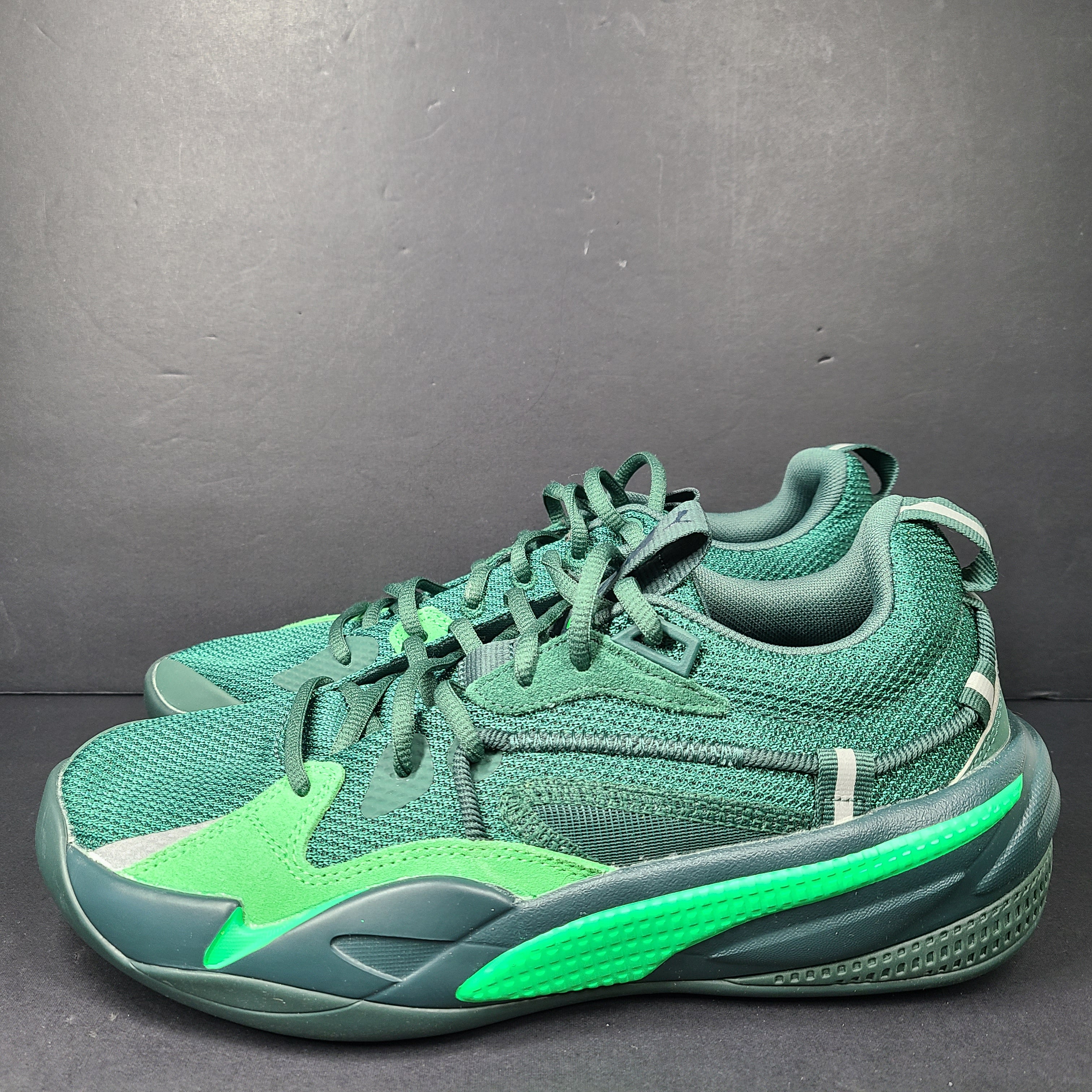 Stylish Puma Dreamer 2 J. Cole Basketball Shoes in green.