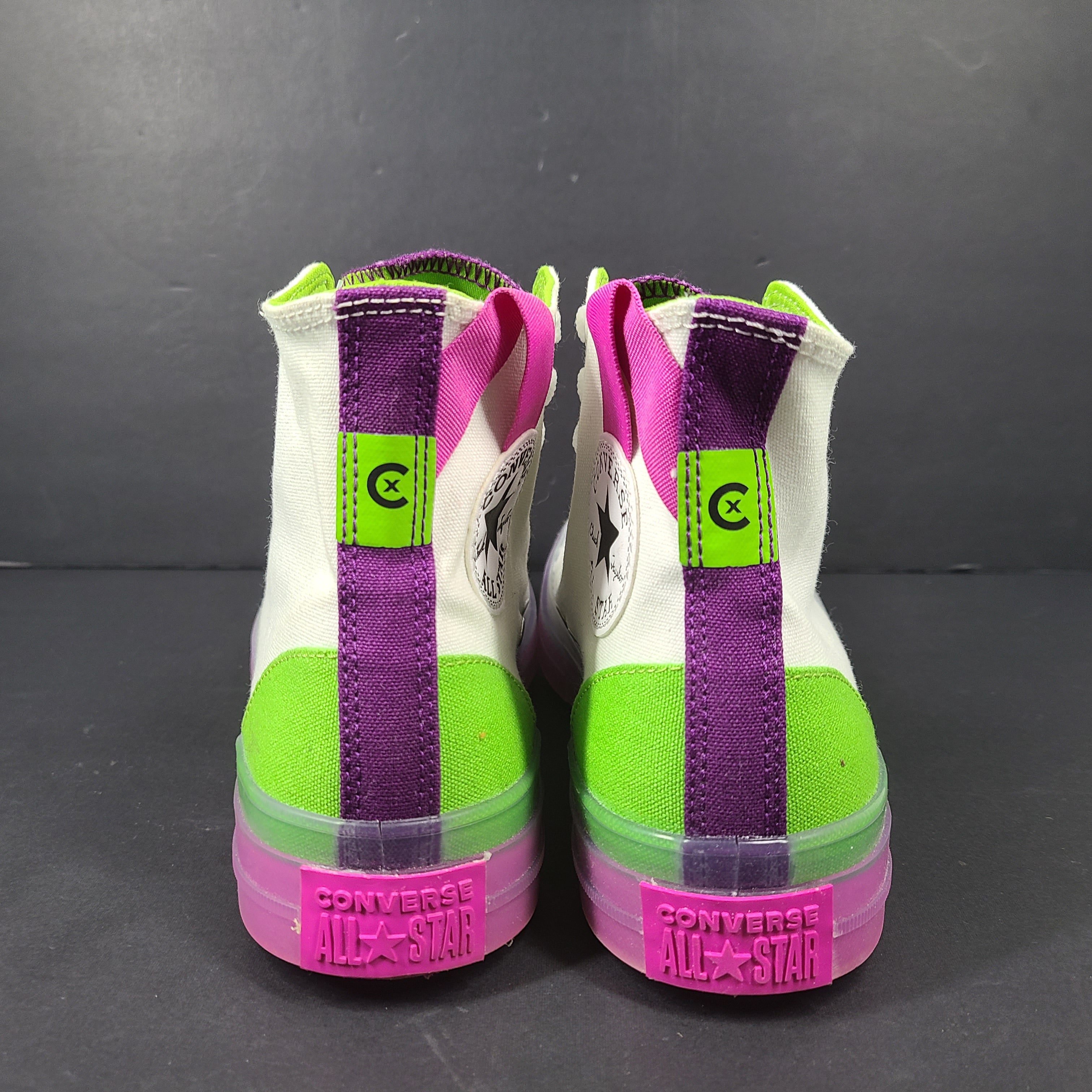 Classic Converse Chuck Taylor All Star high top sneakers in vibrant multicolor design.