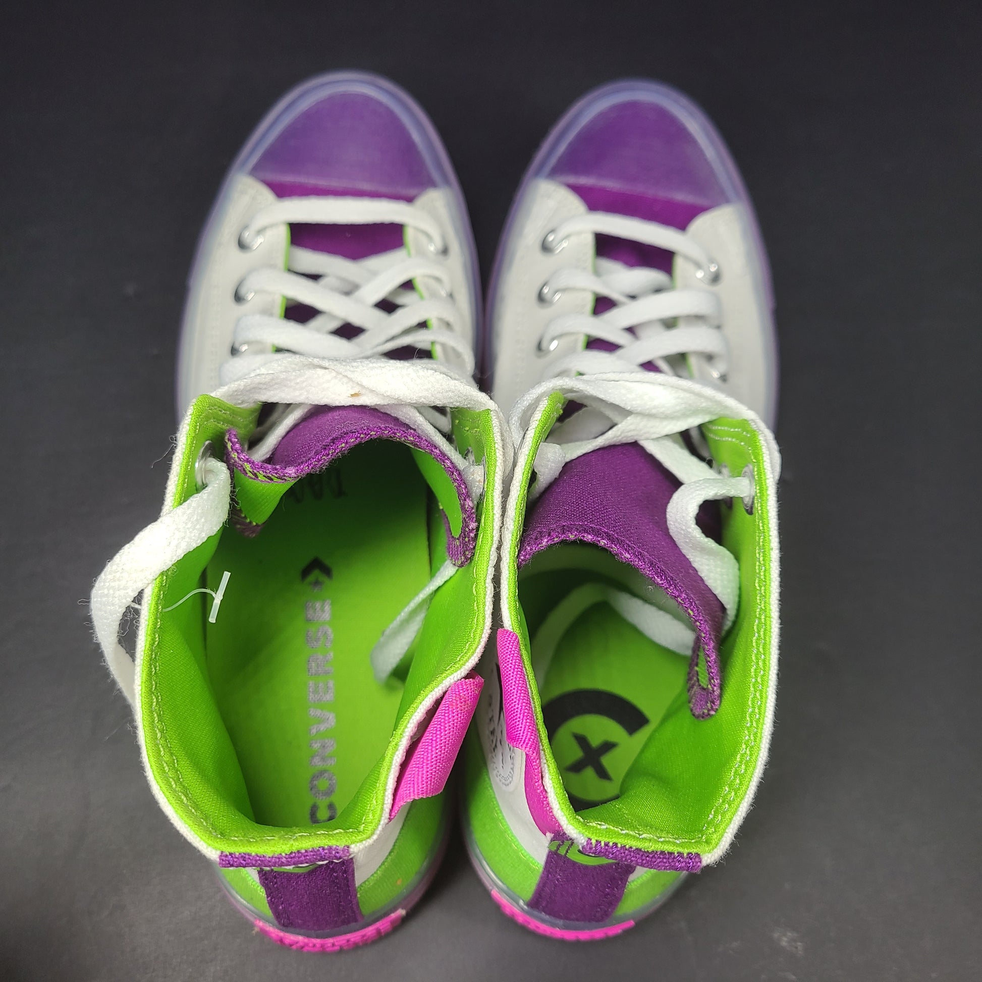 Classic Converse Chuck Taylor All Star high top sneakers in vibrant multicolor design.