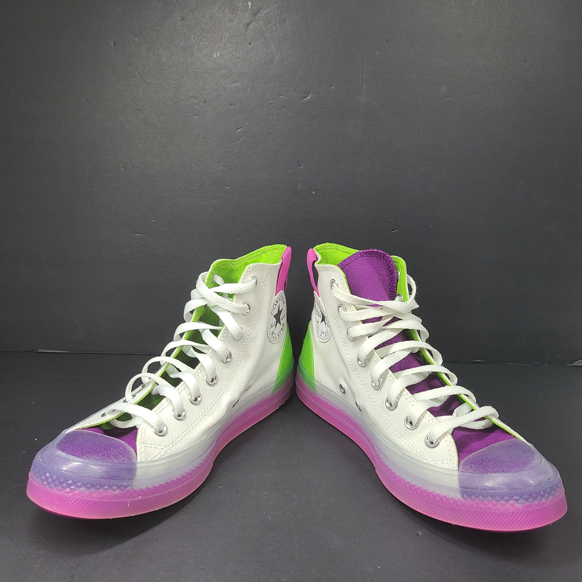 Classic Converse Chuck Taylor All Star high top sneakers in vibrant multicolor design.