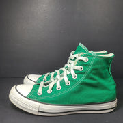 A pair of green Converse All Star high top sneakers for men and women.