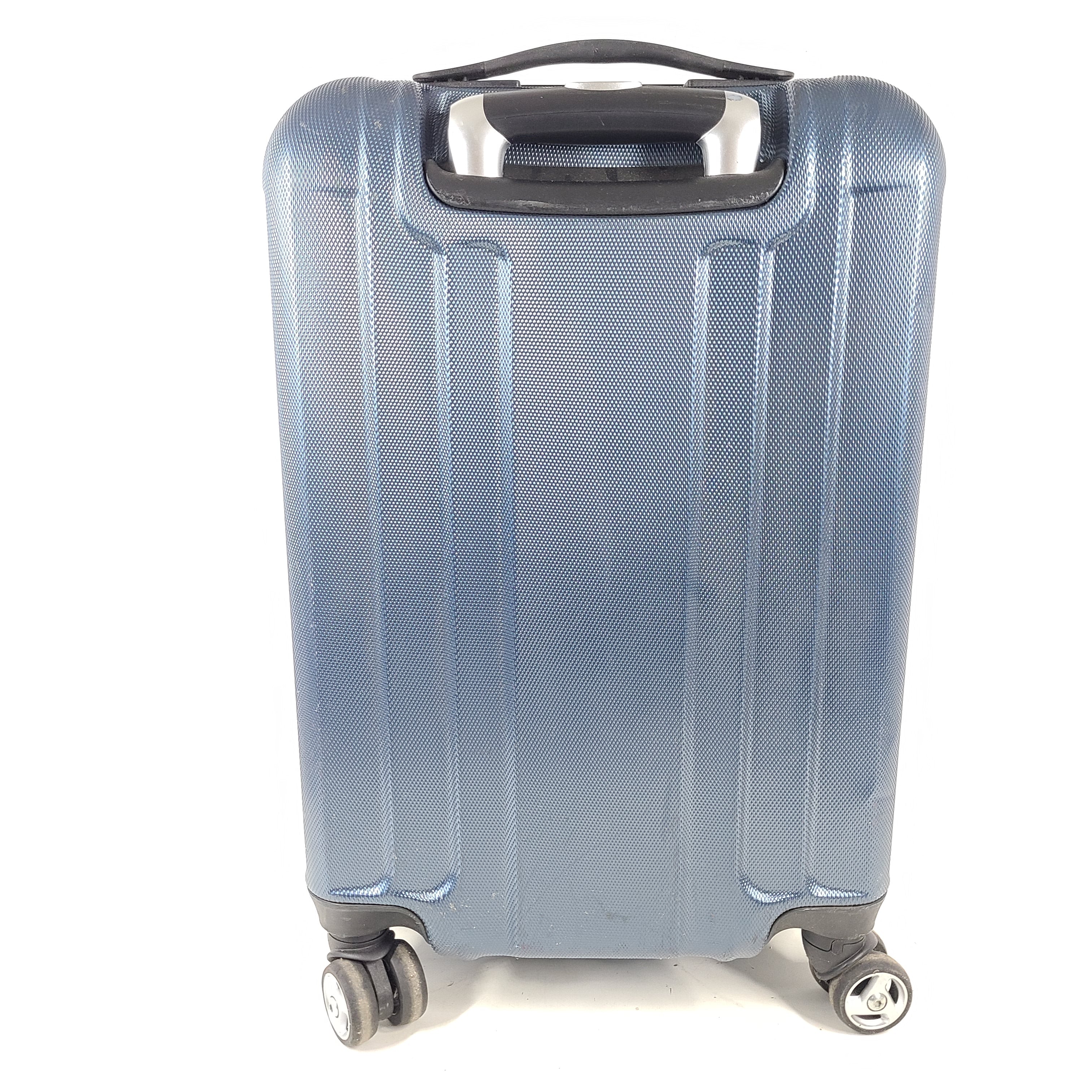 A blue hard shell suitcase by Skyway Luggage Co.