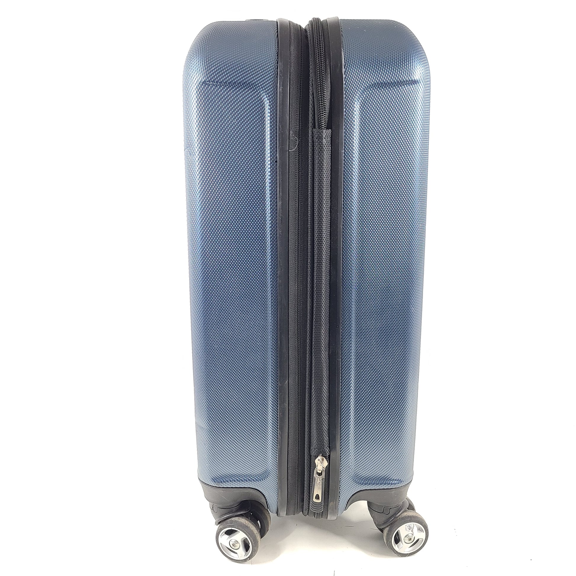 A blue hard shell suitcase by Skyway Luggage Co.