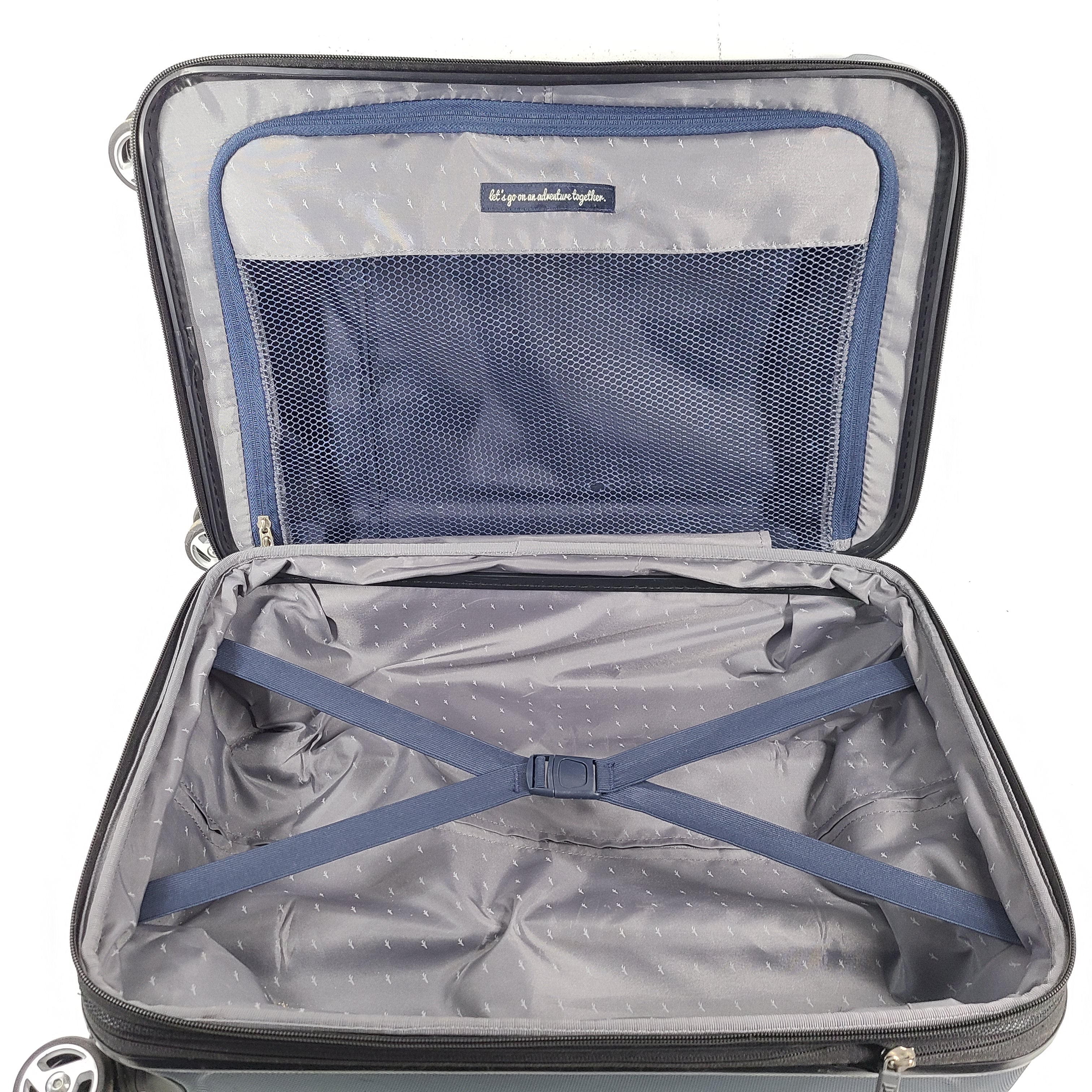 A blue hard shell suitcase by Skyway Luggage Co.