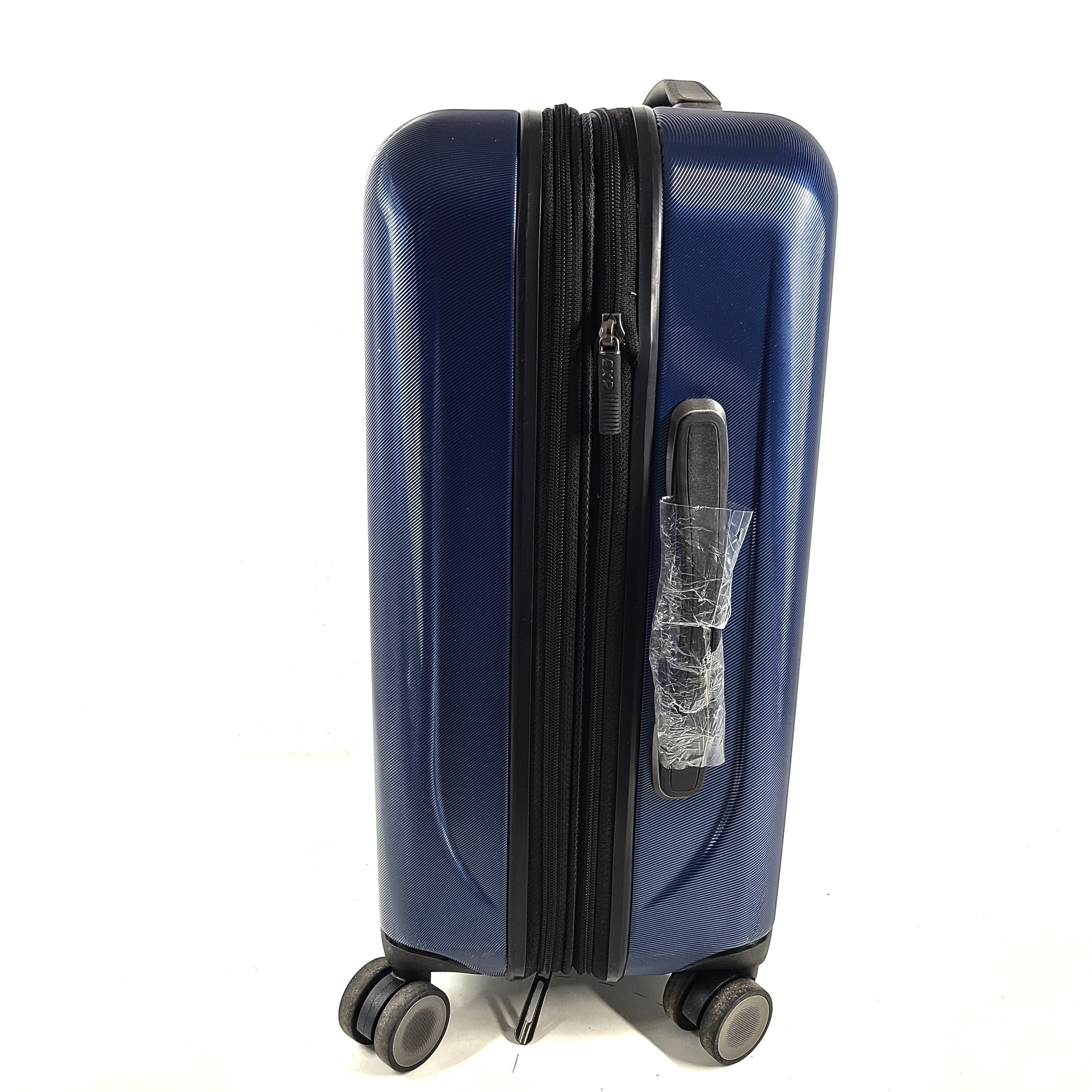 A sleek blue spinner luggage by Ricardo Beverly Hills.