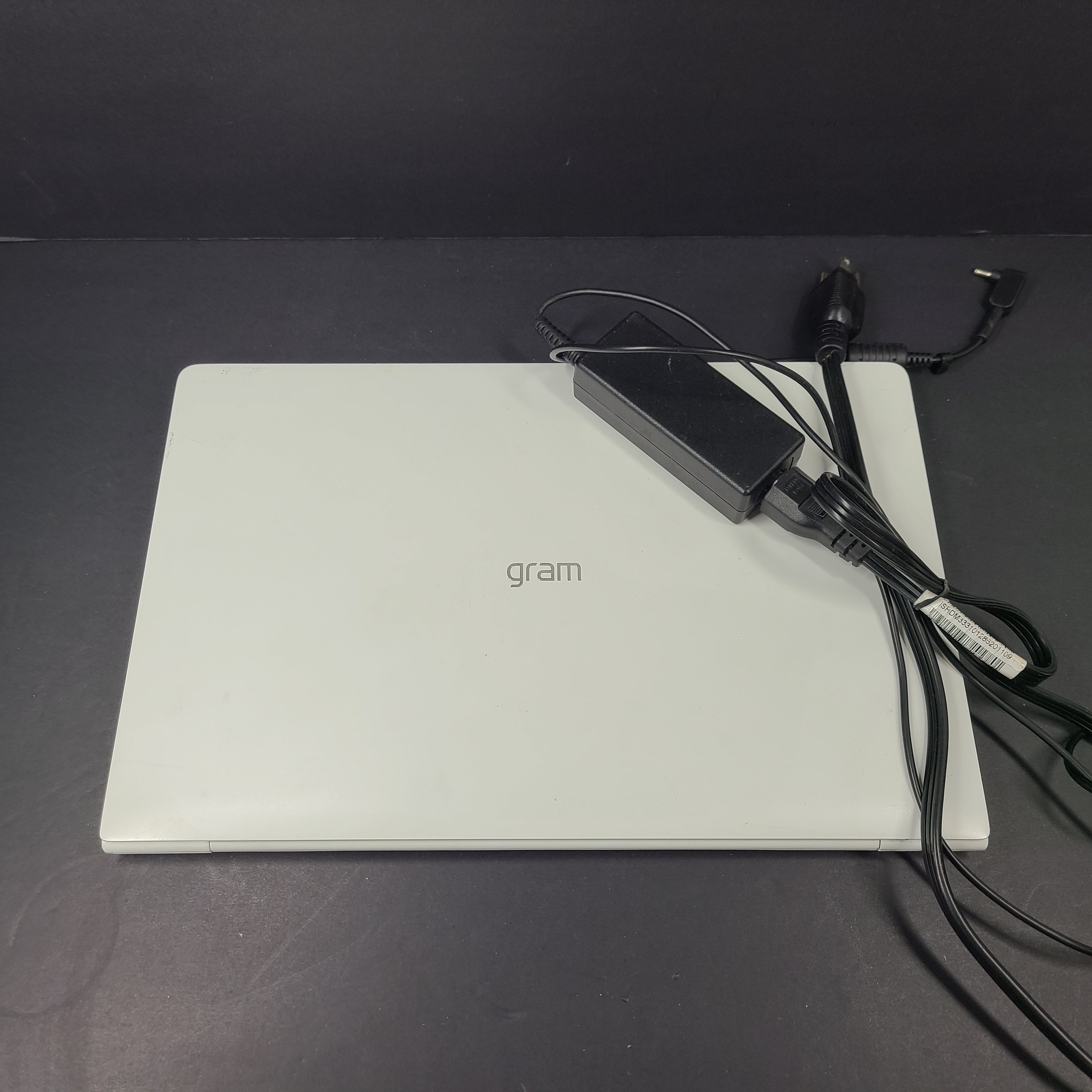 A sleek and lightweight white LG Gram Laptop 14Z980-U.AAW5U1 14-inch