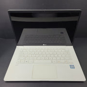 A sleek and lightweight white LG Gram Laptop 14Z980-U.AAW5U1 14-inch