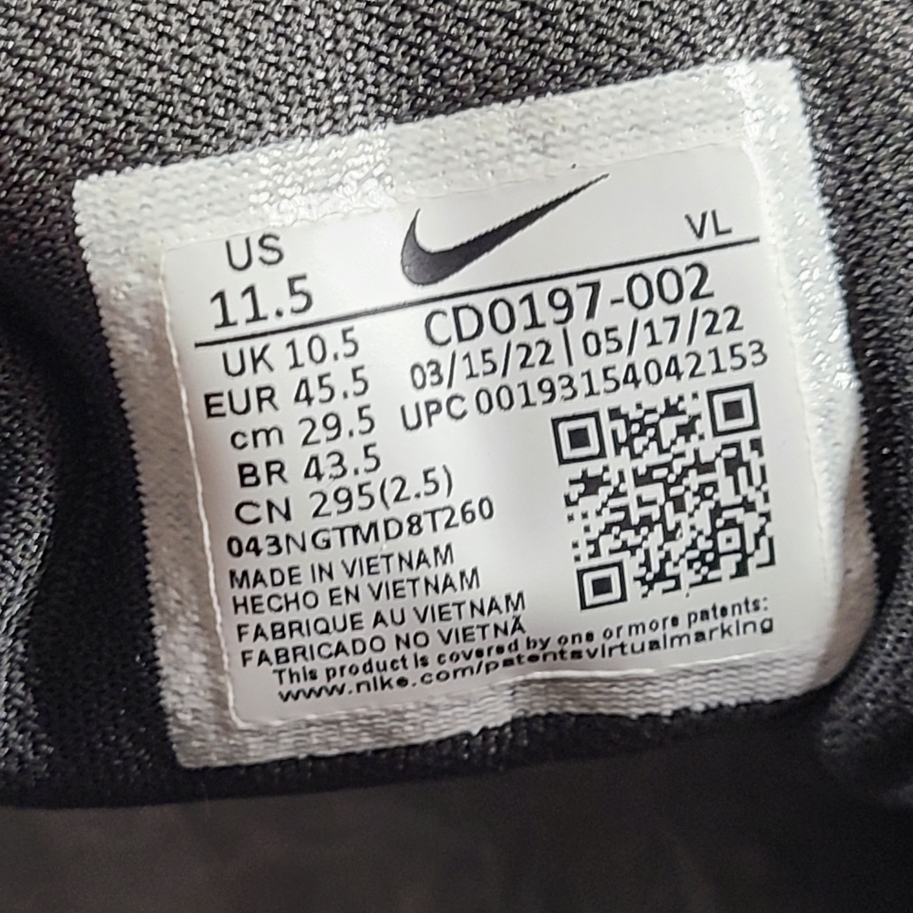 A pair of Nike Flex Training Shoes in Black and White