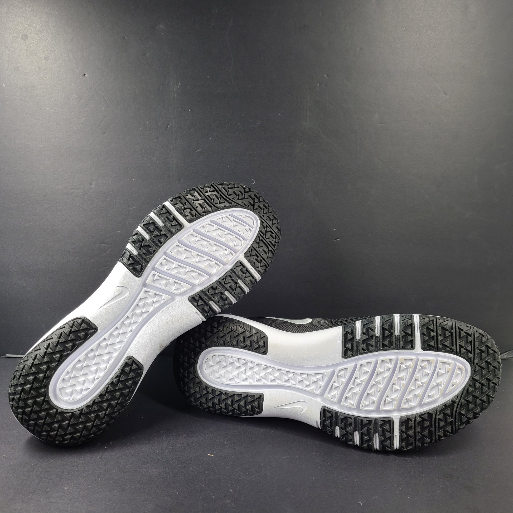 A pair of Nike Flex Training Shoes in Black and White