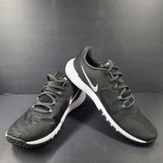 A pair of Nike Flex Training Shoes in Black and White