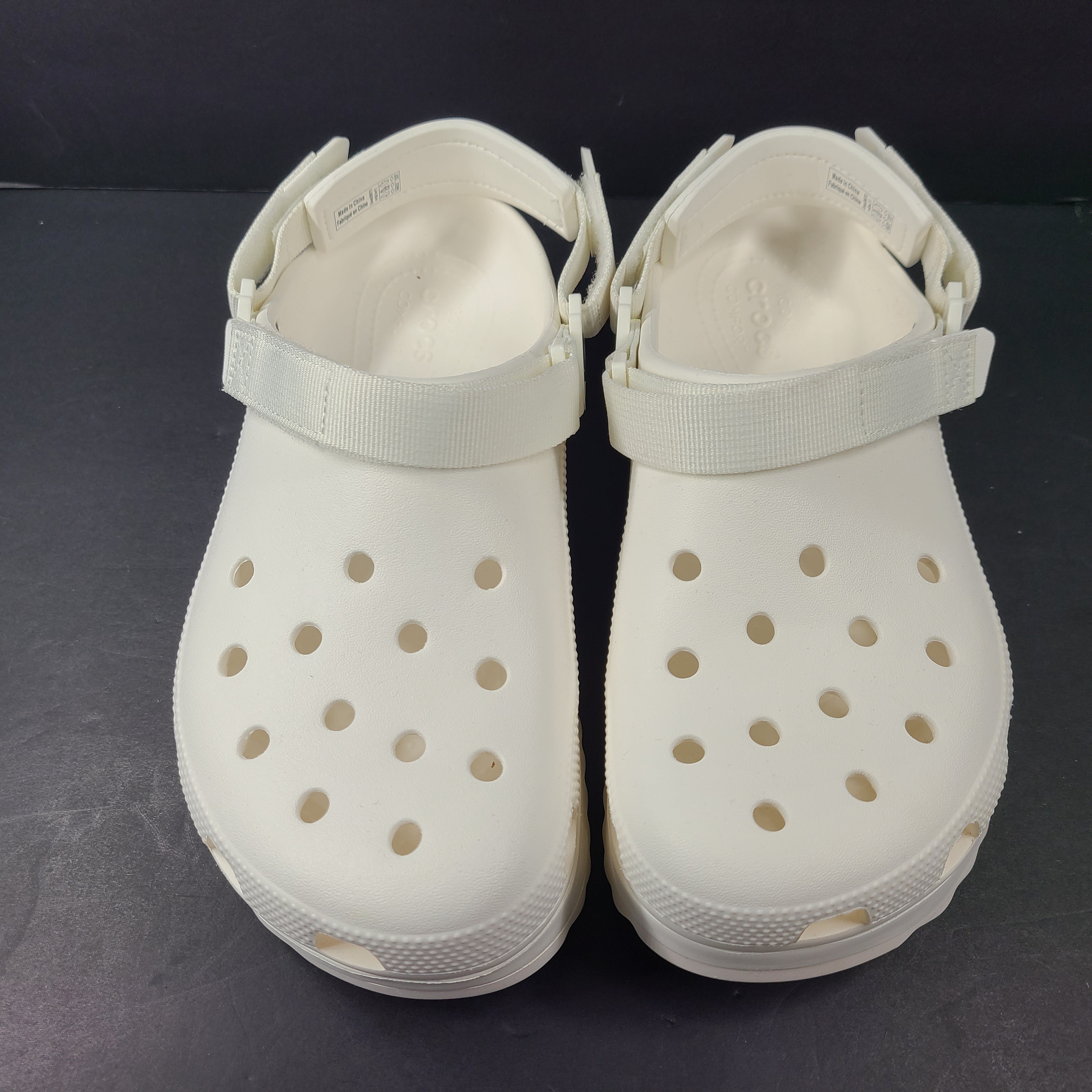 A pair of white Crocs Classic Platform Clogs