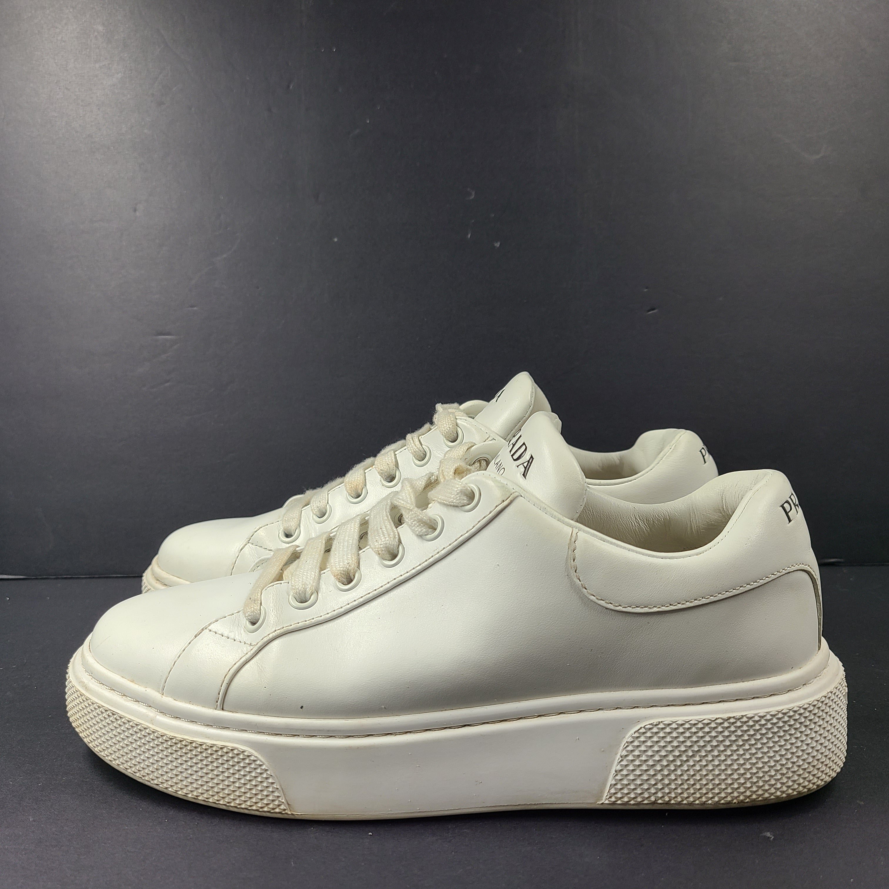 Stylish white Prada Milano leather sneakers in size 37.5