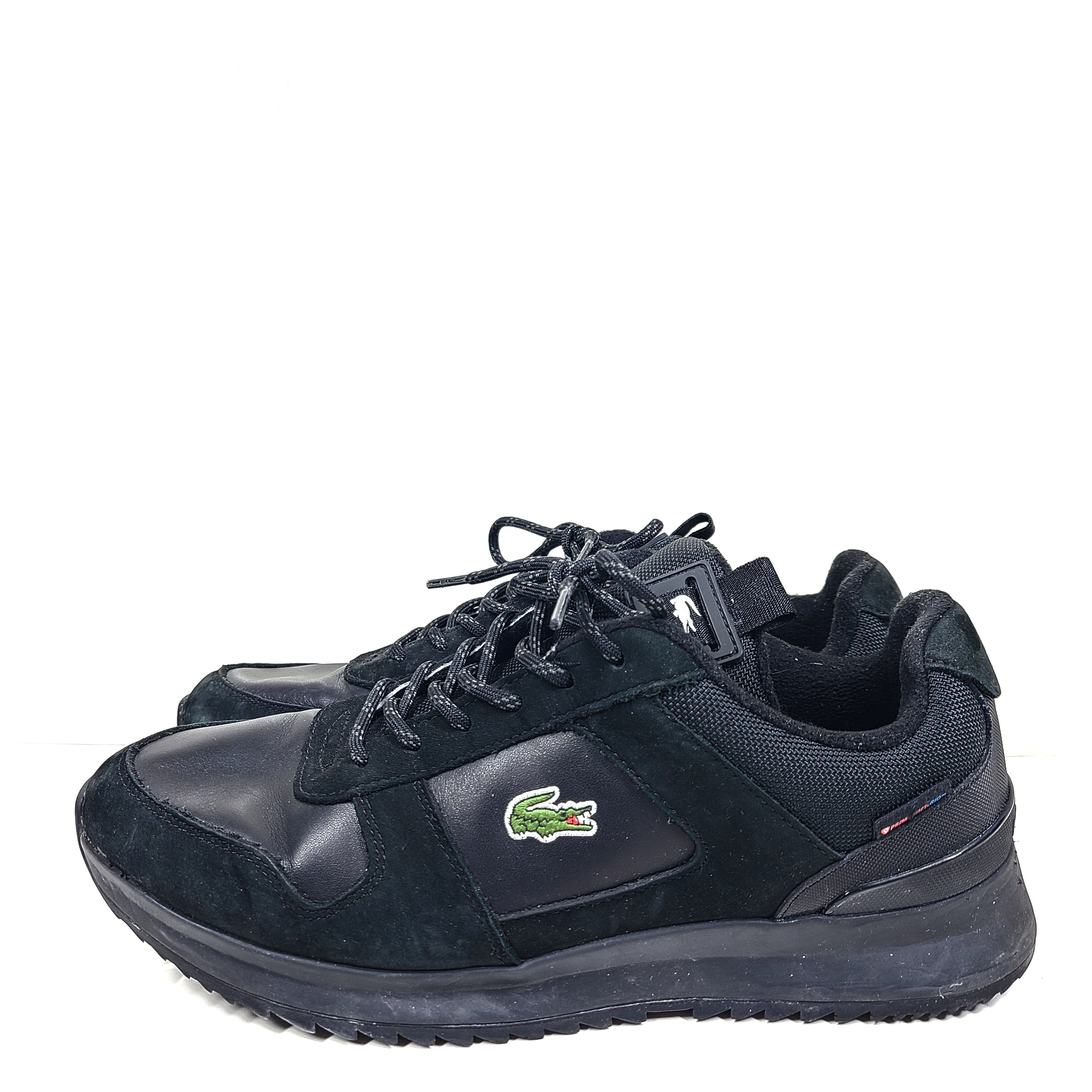 A pair of black Lacoste Joggeur 2.0 sneakers for men in size 10.