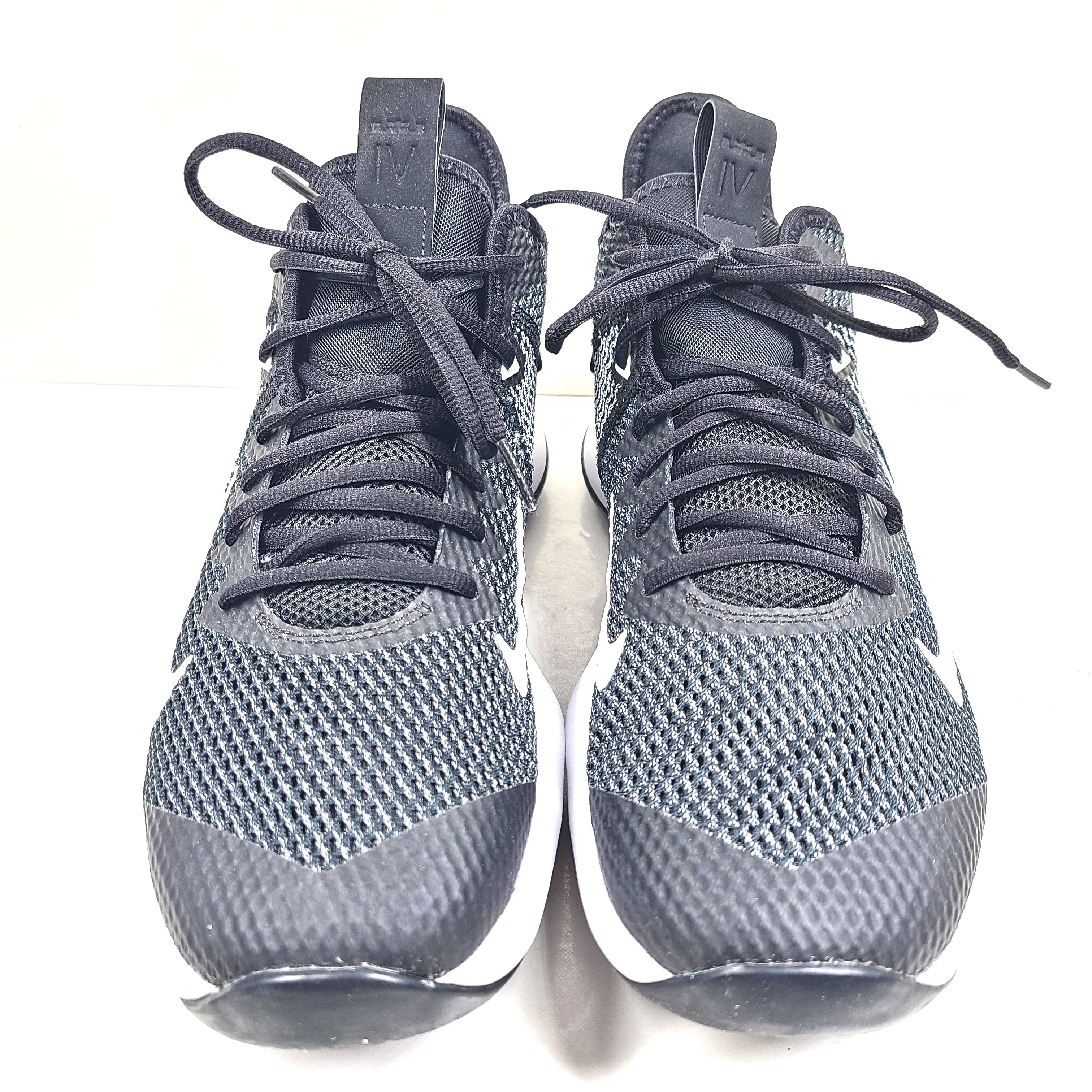 A pair of Nike LeBron 17 Basketball Shoes in Black and White color combination.
