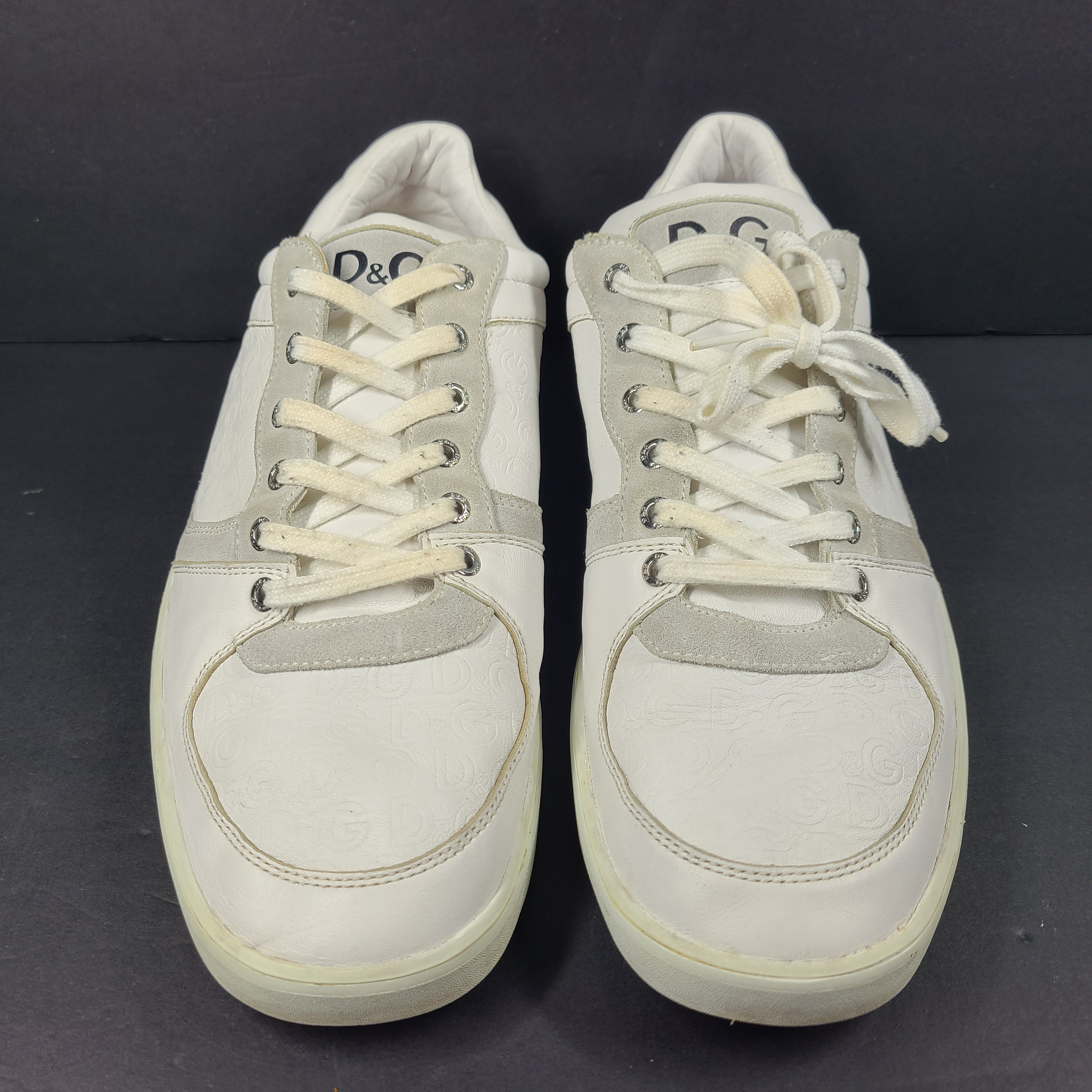 A pair of white D&G Dolce & Gabbana sneakers
