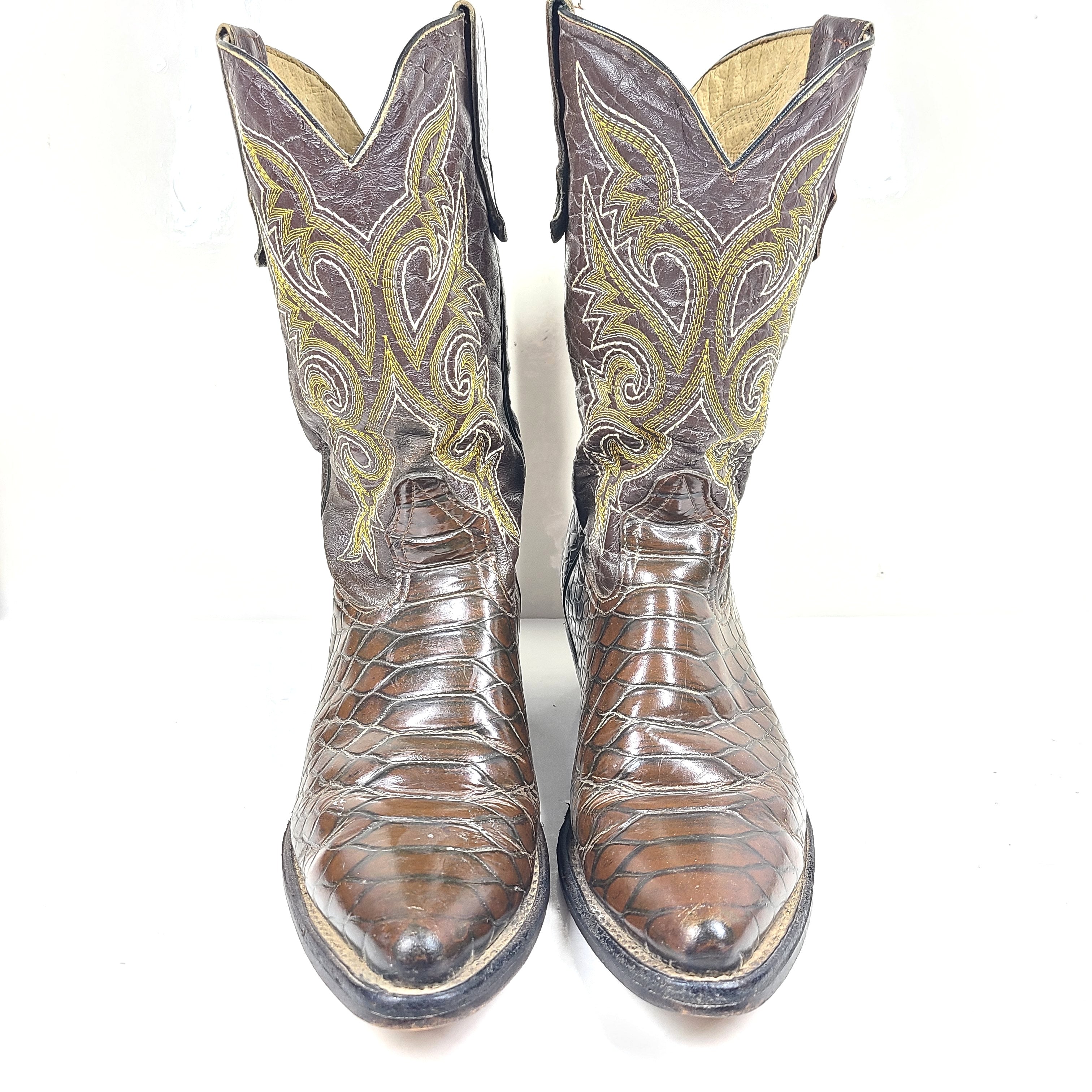 A pair of brown leather women's cowboy boots