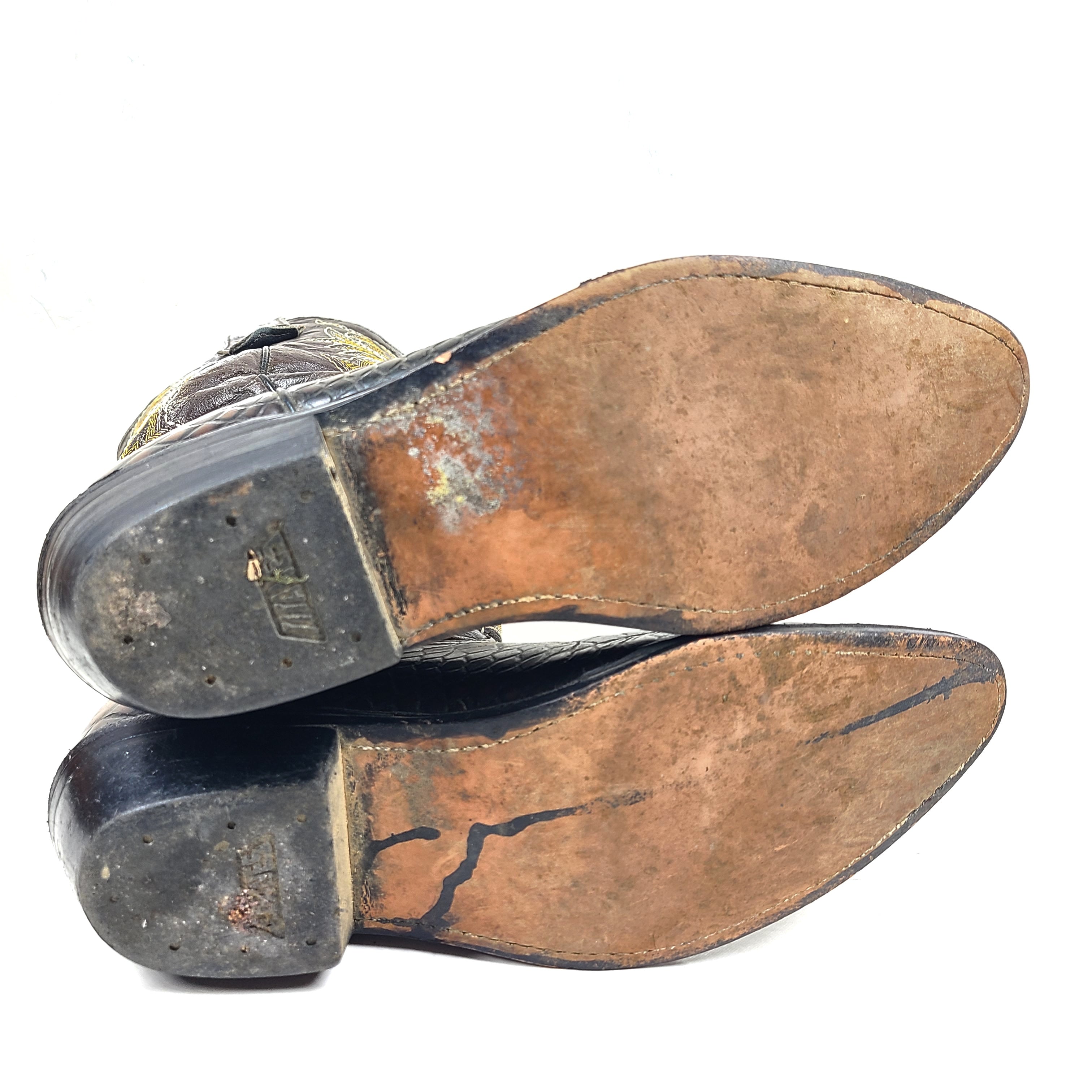 A pair of brown leather women's cowboy boots