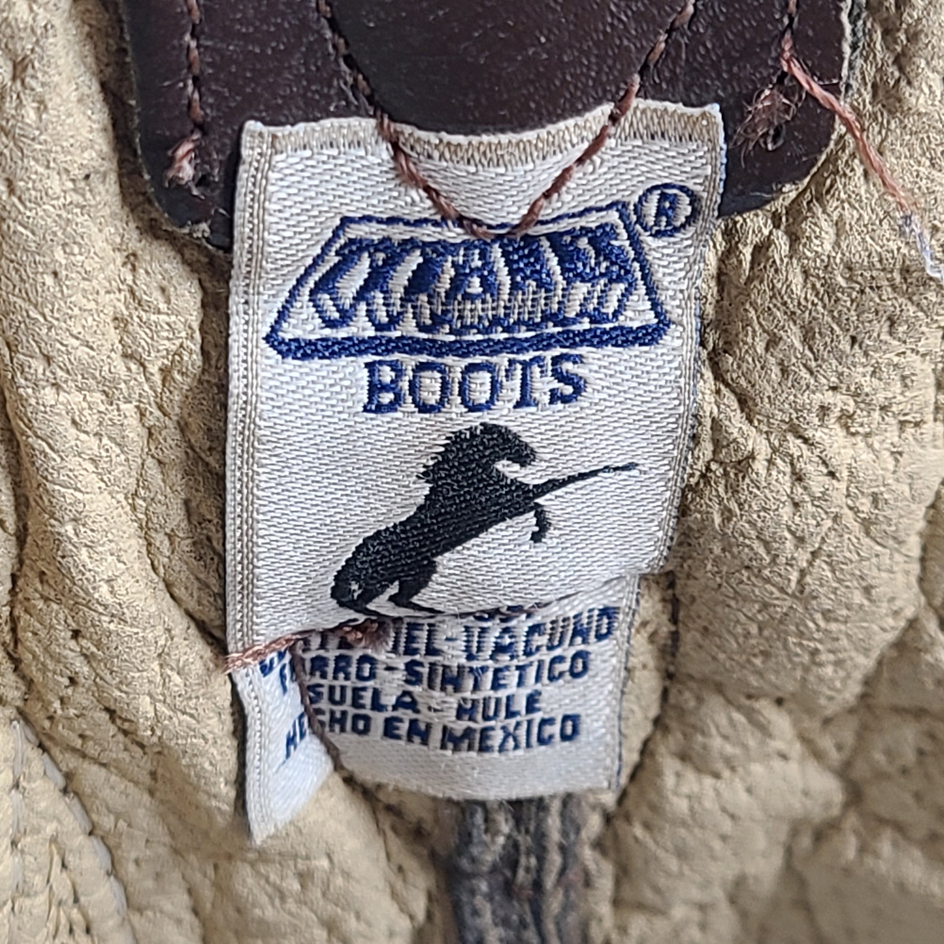 A pair of brown leather women's cowboy boots