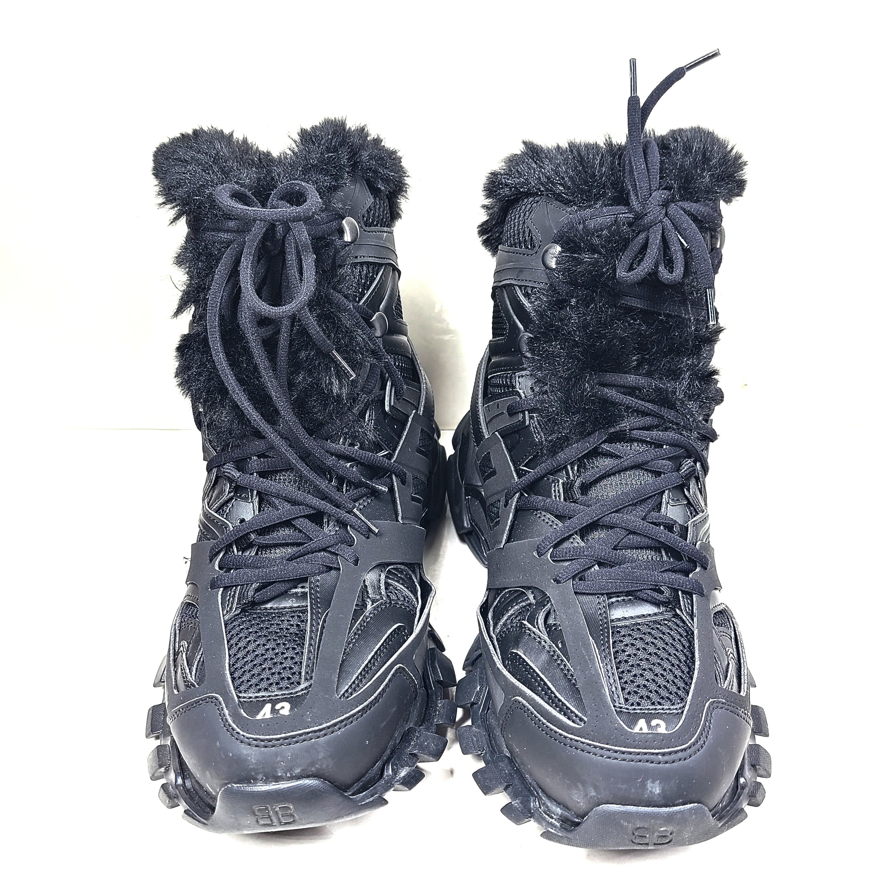 A pair of stylish men's black Balenciaga Track Sneakers with fur lining