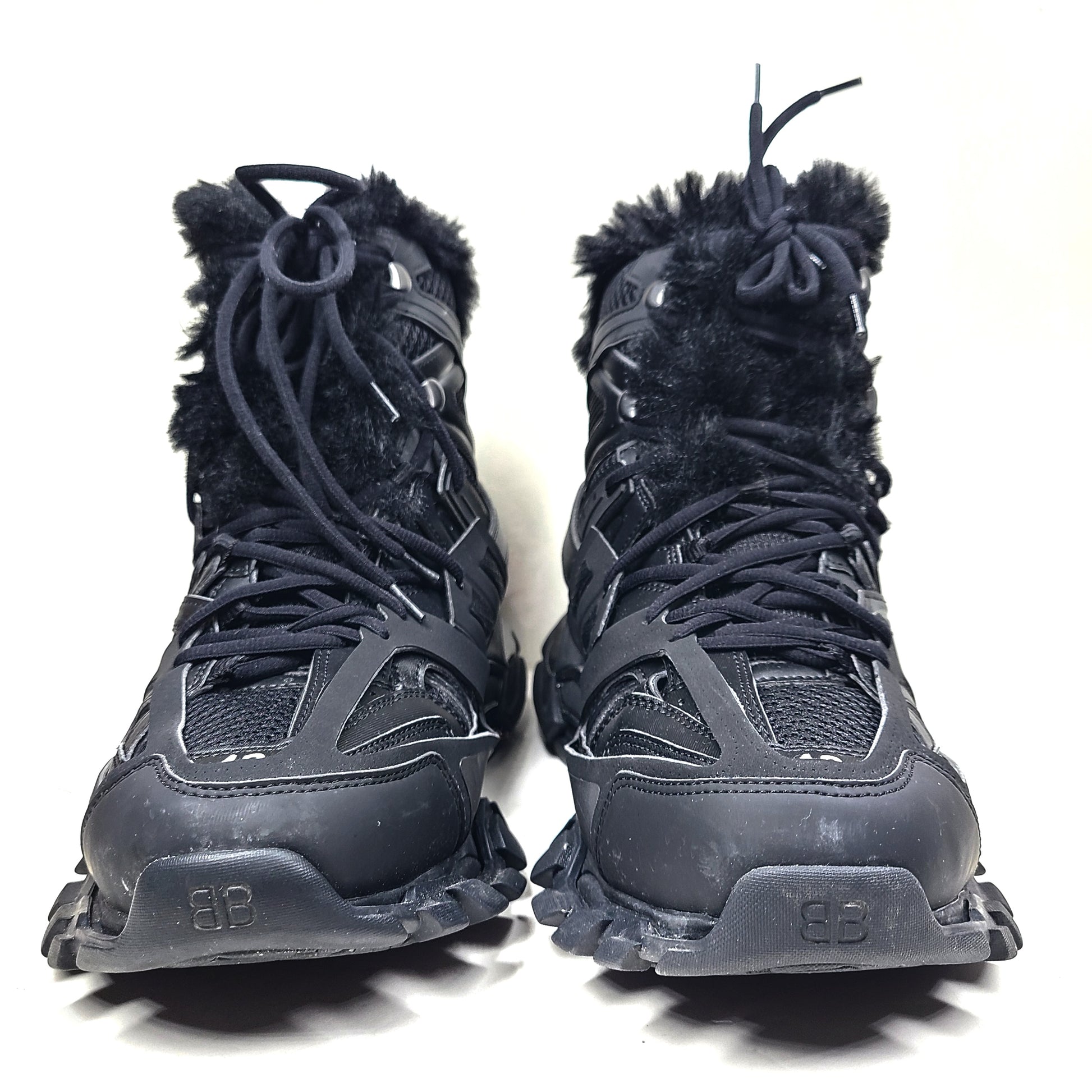 A pair of stylish men's black Balenciaga Track Sneakers with fur lining