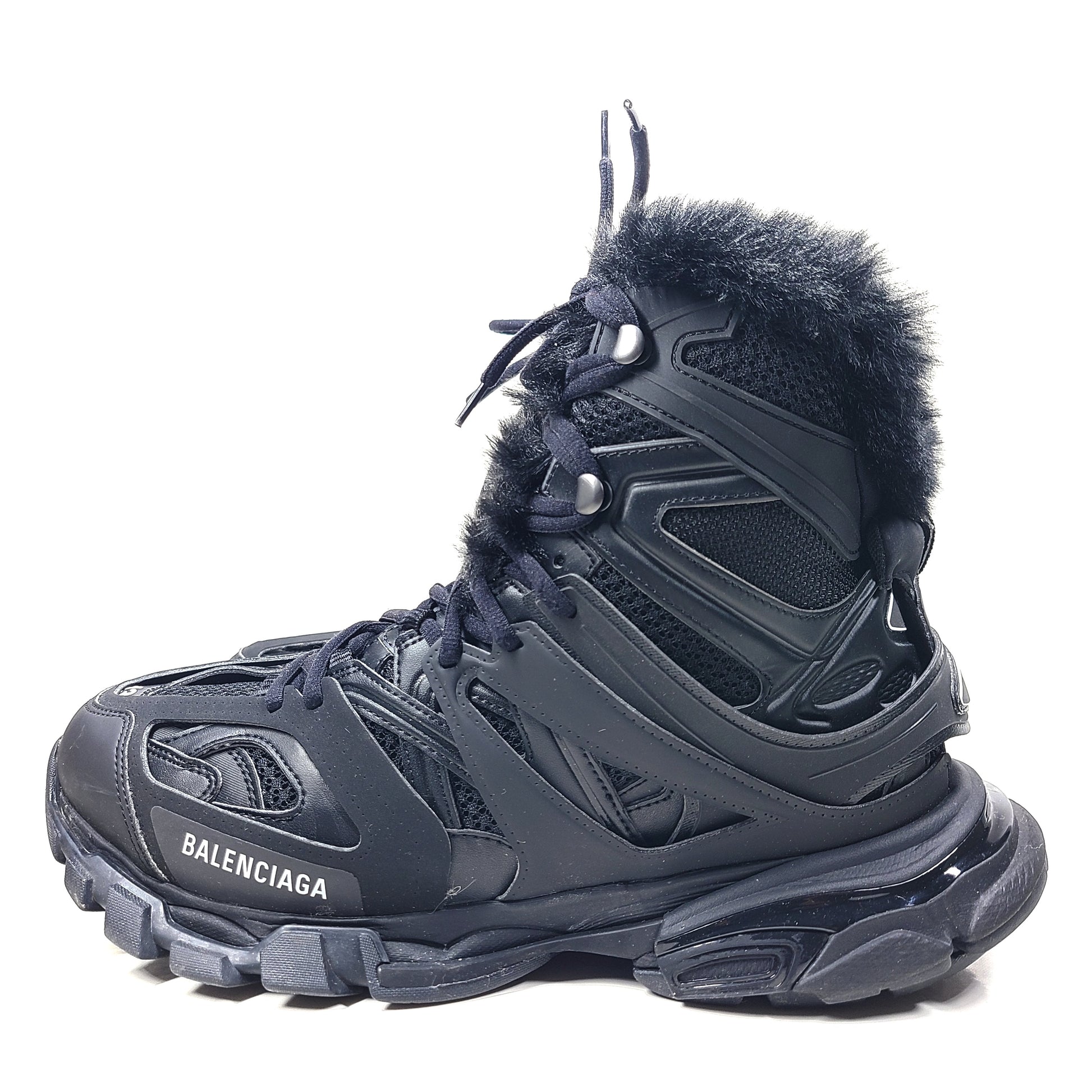 A pair of stylish men's black Balenciaga Track Sneakers with fur lining