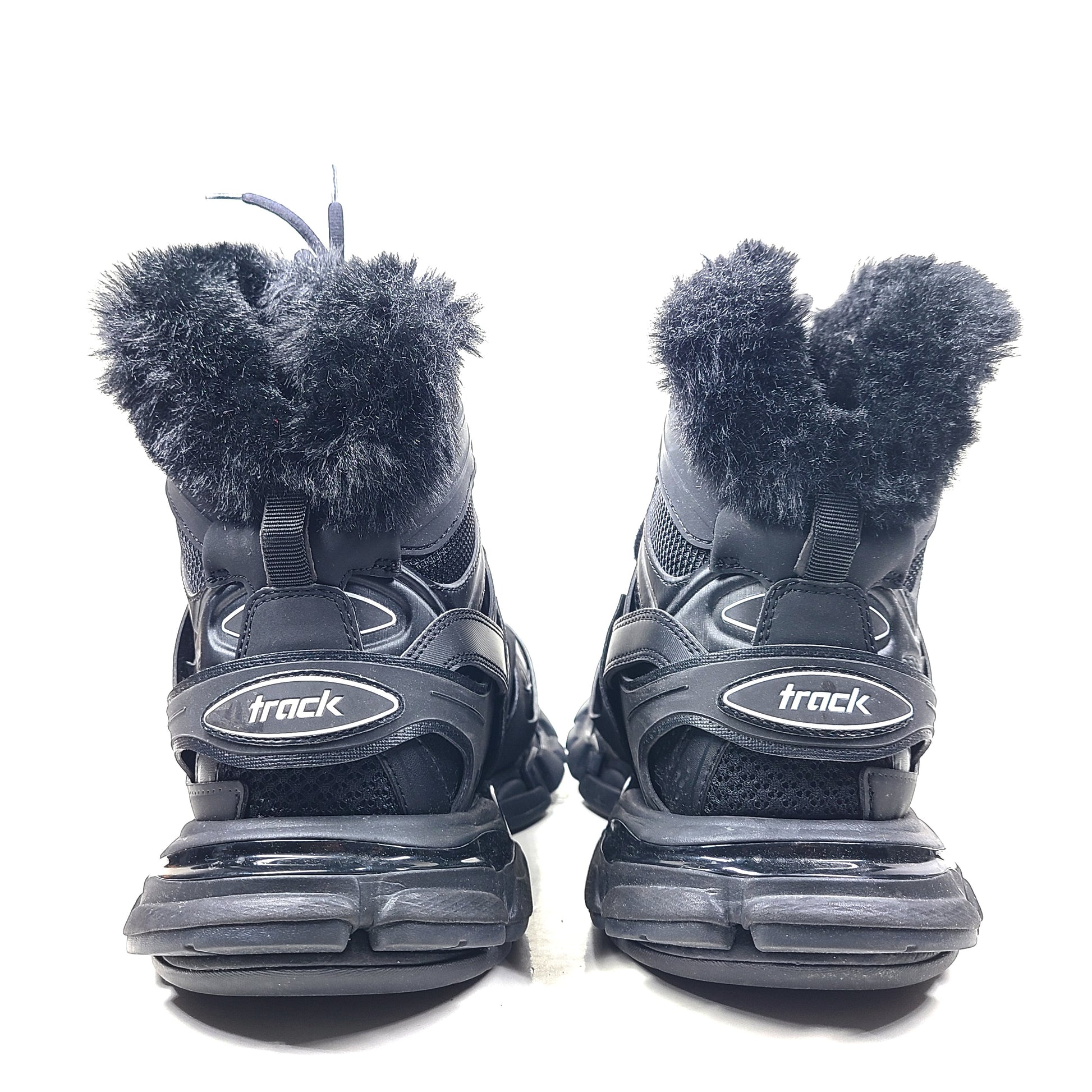 A pair of stylish men's black Balenciaga Track Sneakers with fur lining