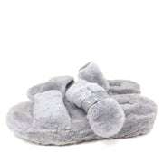 A pair of gray UGG Fluffy Sandals with adjustable straps in size 7.