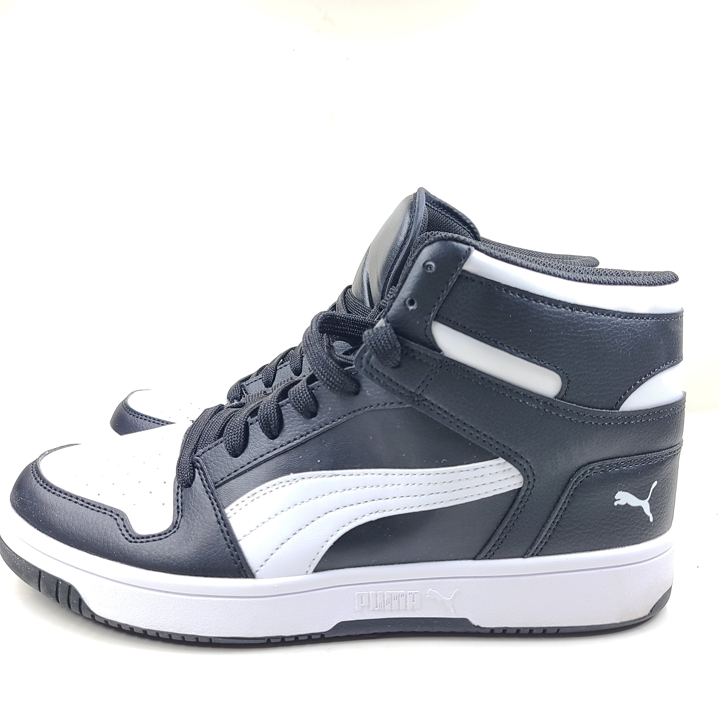 Stylish black and white men's high-top sneakers