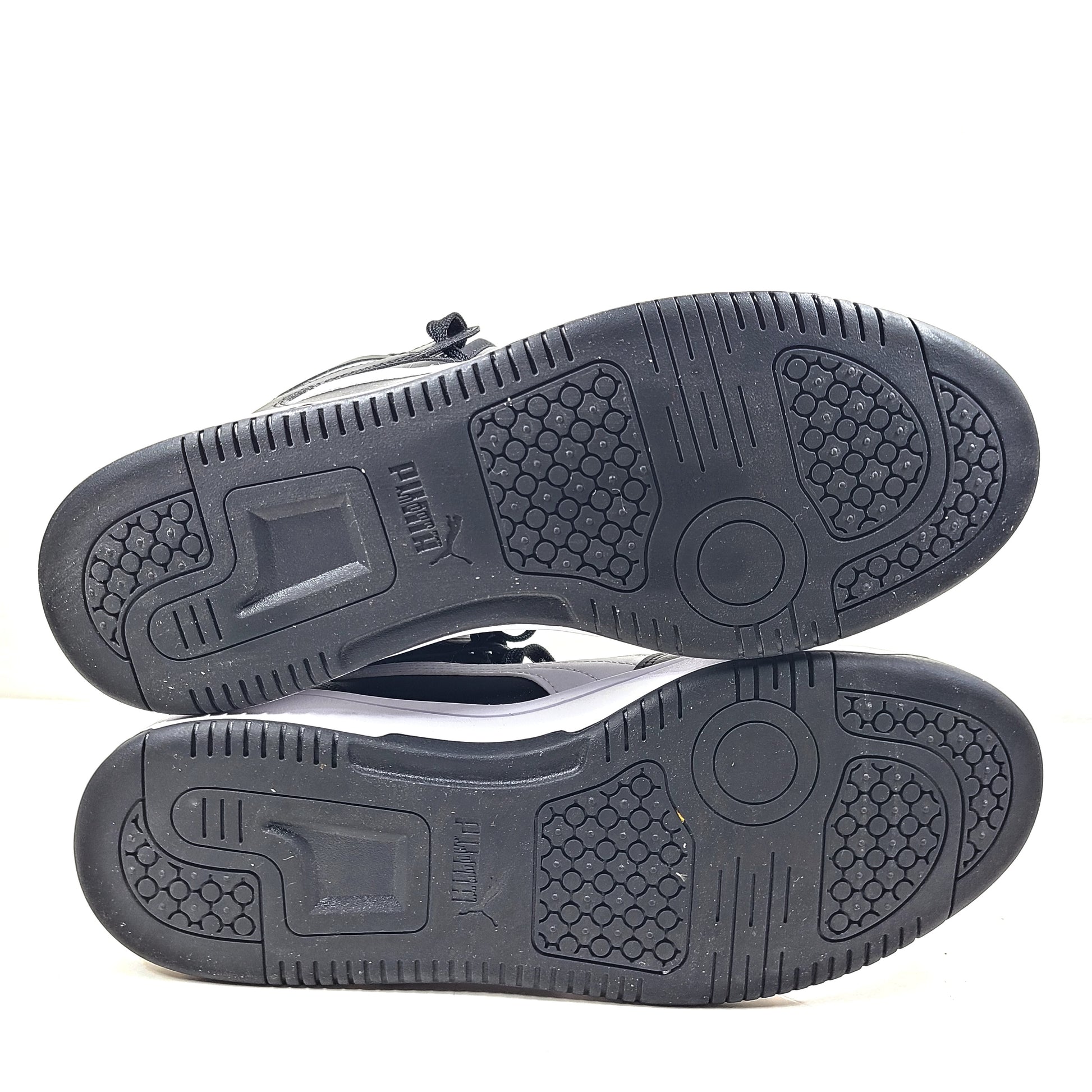 Stylish black and white men's high-top sneakers