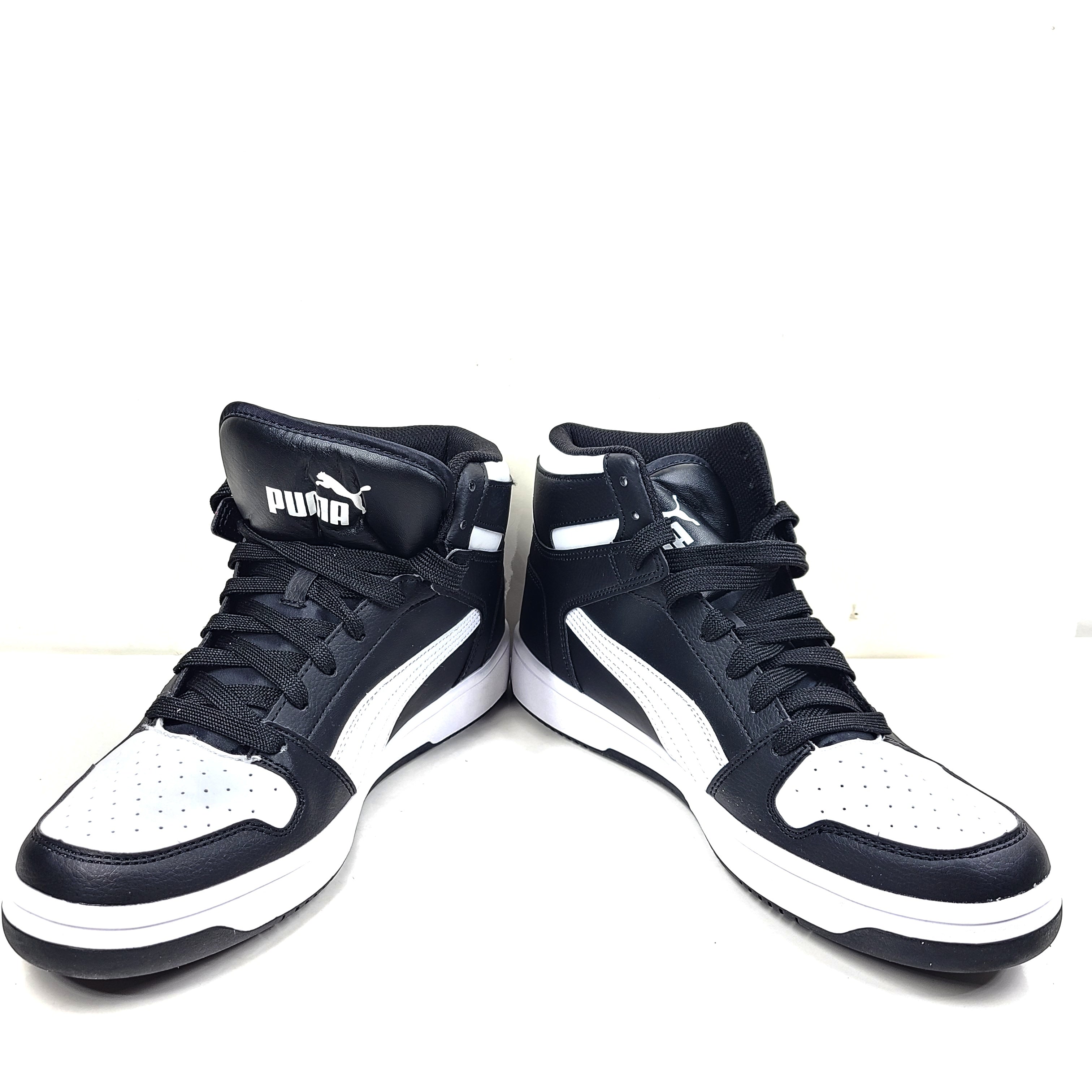 Stylish black and white men's high-top sneakers