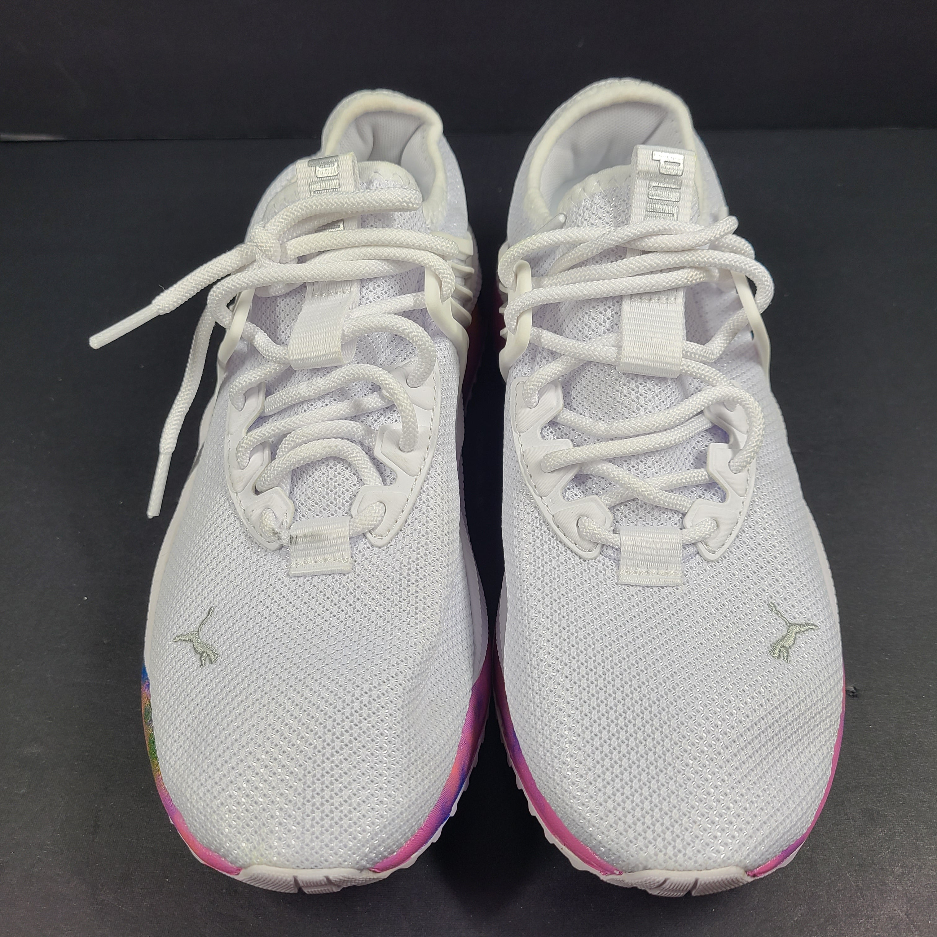 A pair of Puma Women's SoftFoam Sneakers in White and Multicolor