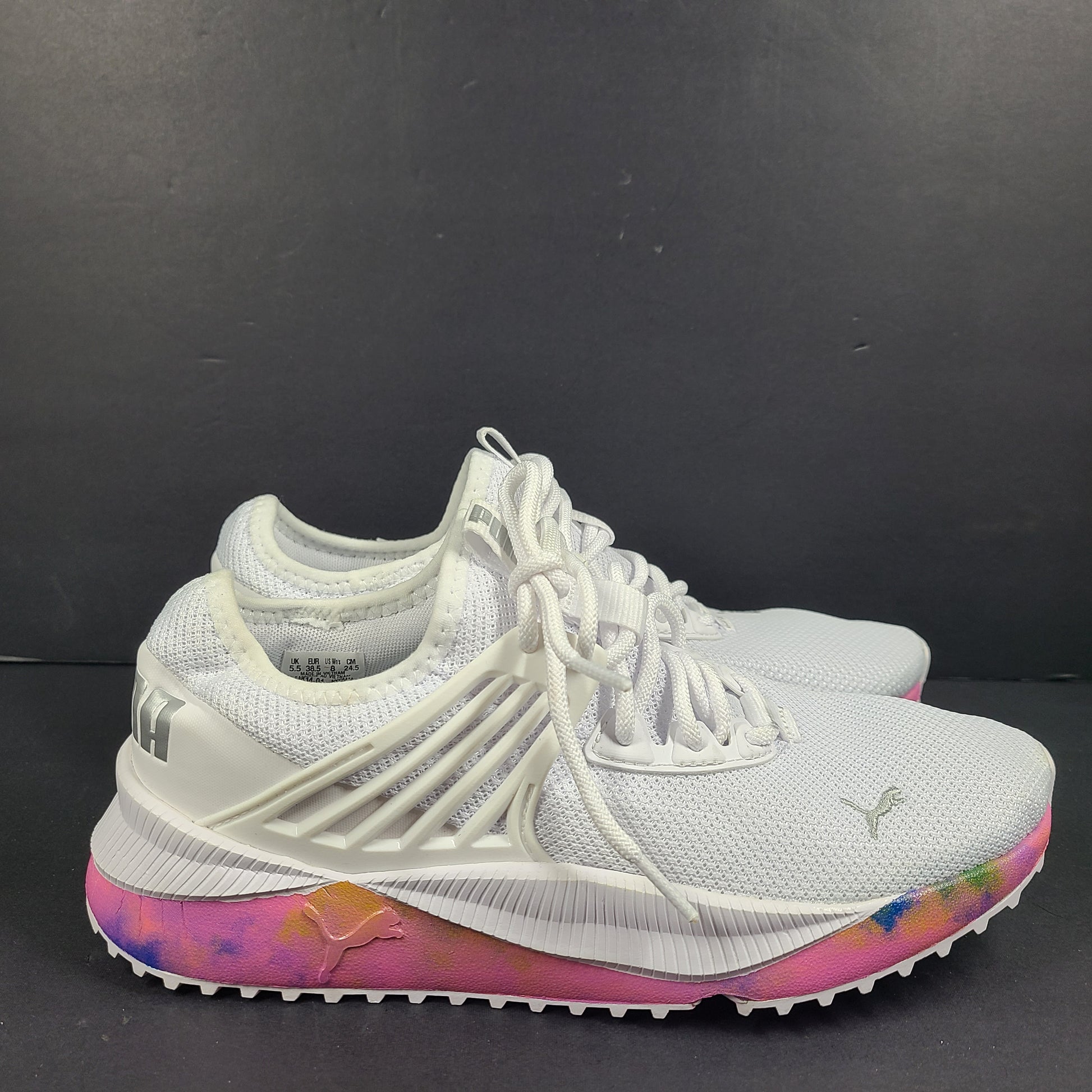 A pair of Puma Women's SoftFoam Sneakers in White and Multicolor