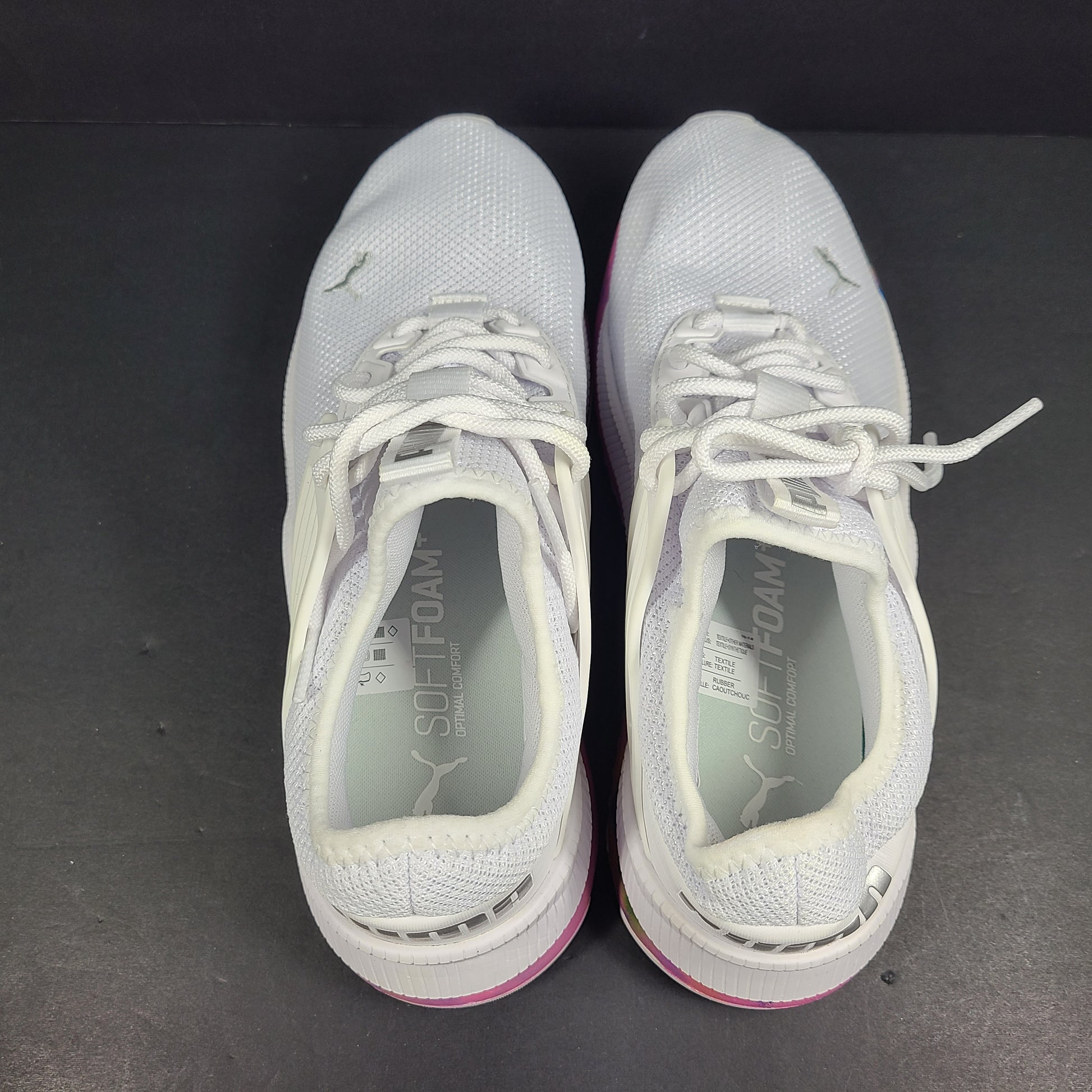 A pair of Puma Women's SoftFoam Sneakers in White and Multicolor