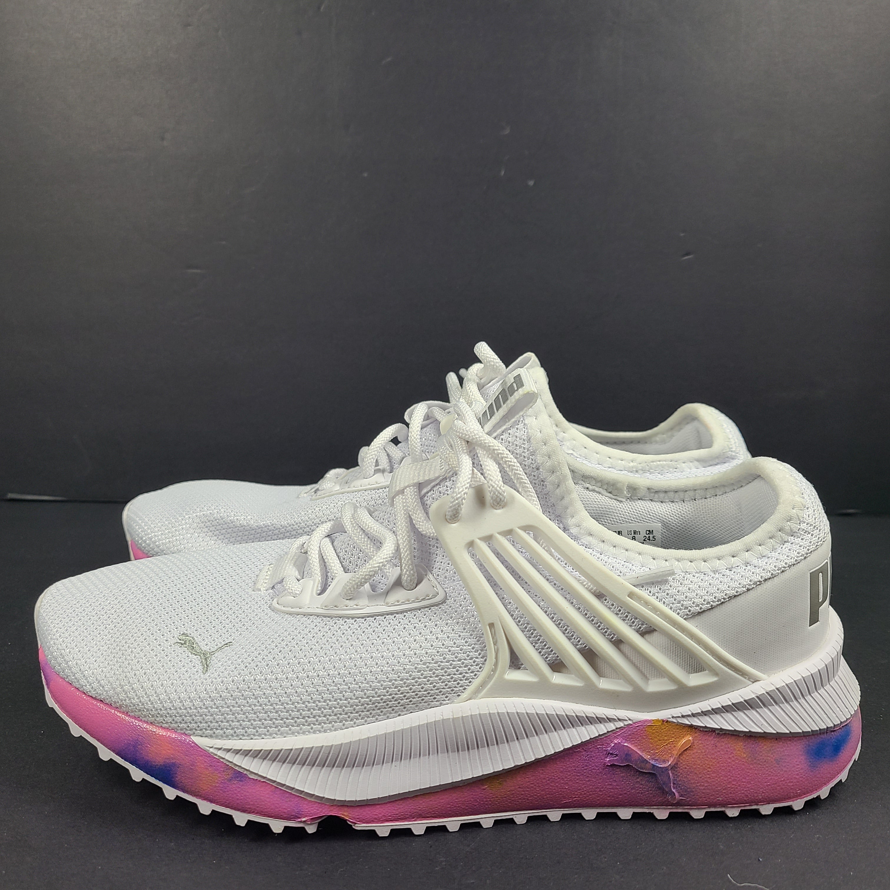 A pair of Puma Women's SoftFoam Sneakers in White and Multicolor