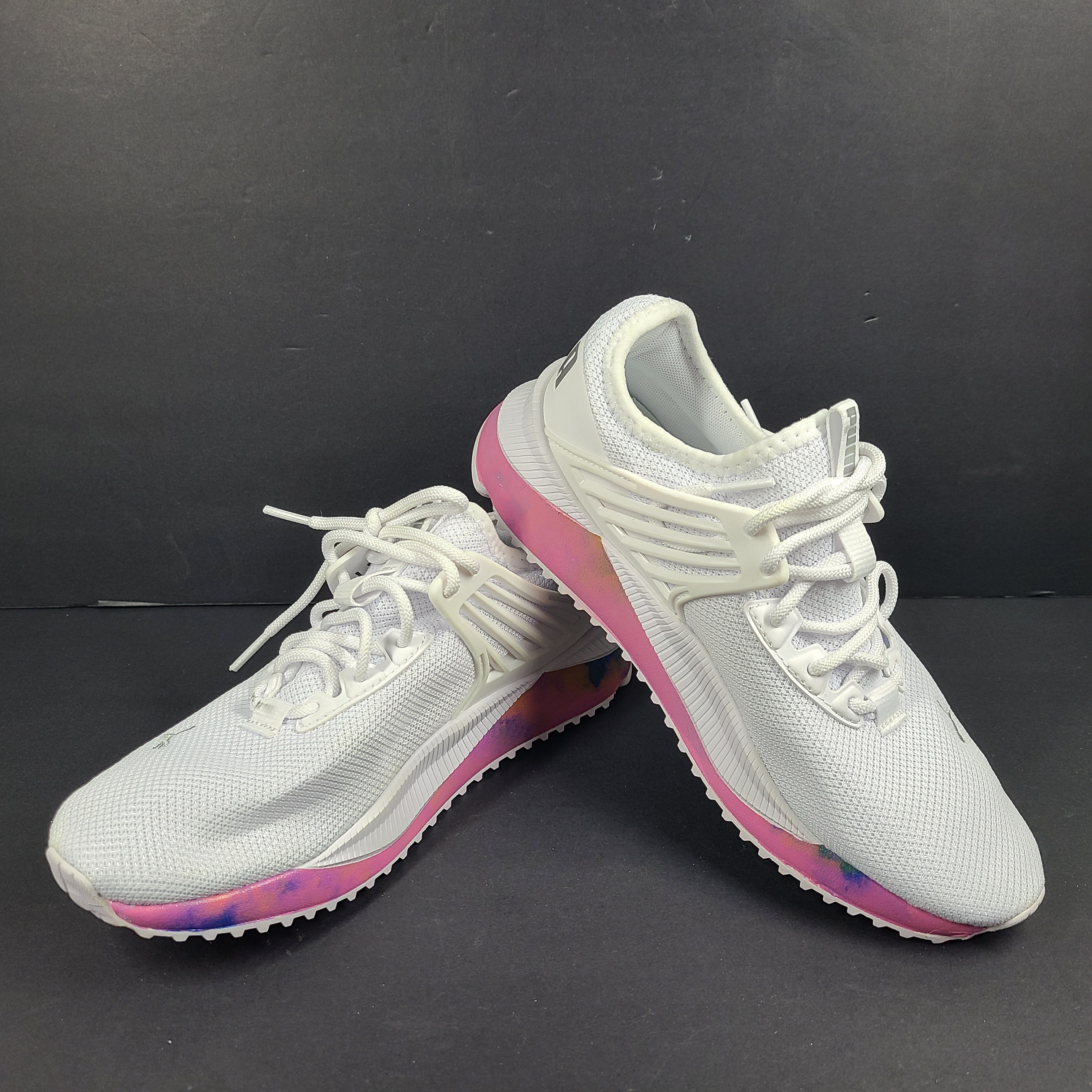 A pair of Puma Women's SoftFoam Sneakers in White and Multicolor