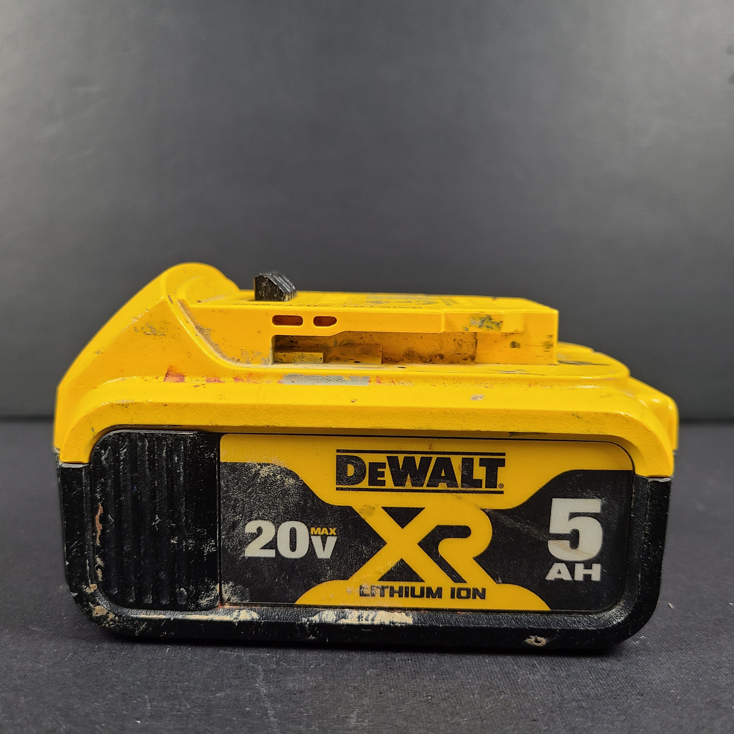 A durable DeWalt 20V Max XR Lithium Ion Battery Pack 5AH DCB205