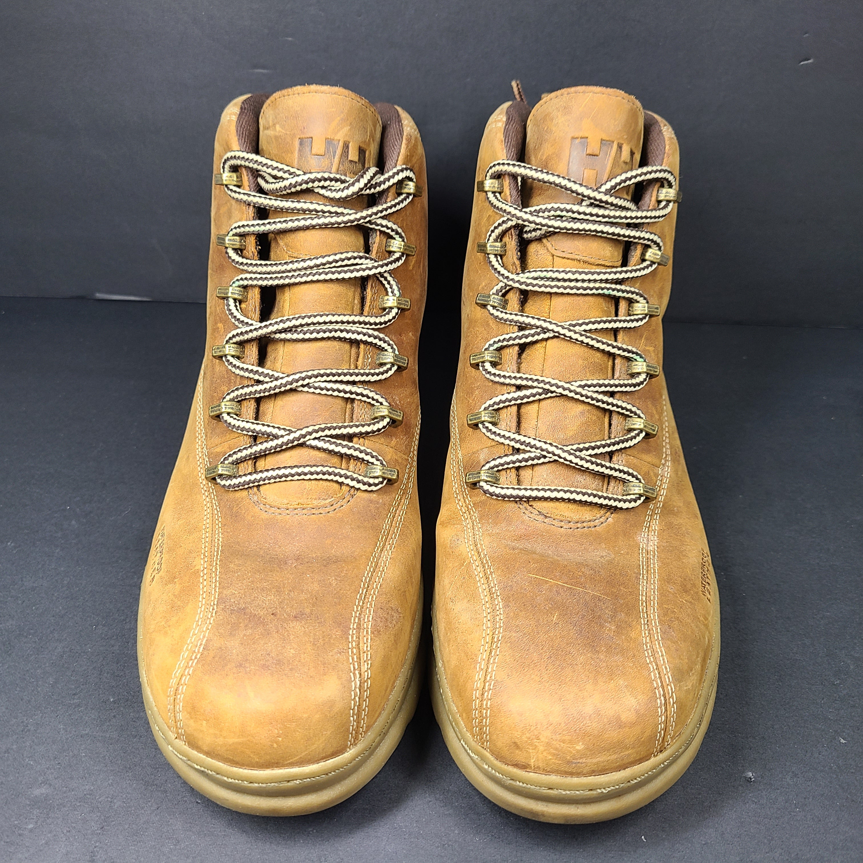A pair of Helly Hansen Men's Waterproof Leather Boots in size US 10.
