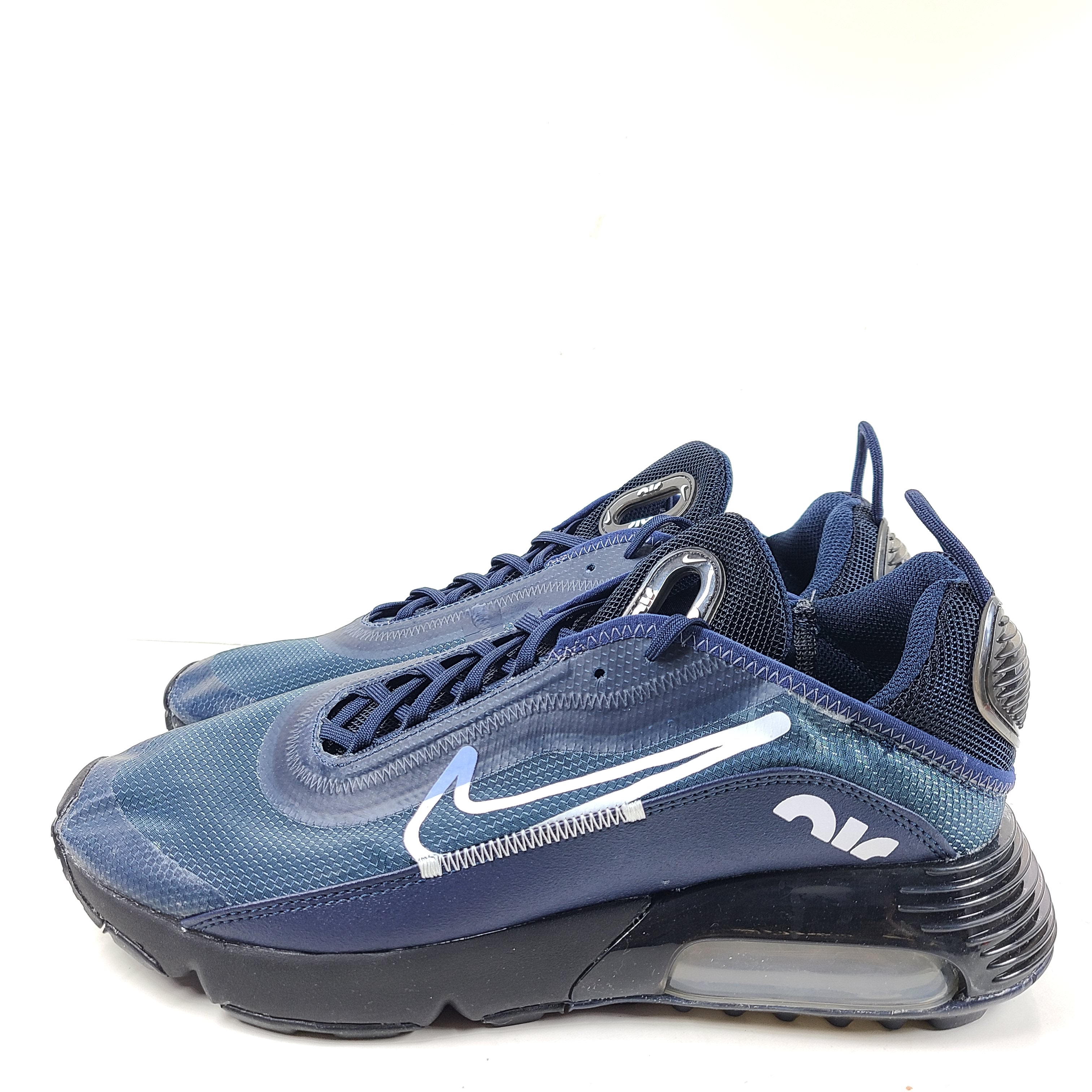 A pair of blue Nike Air Max 2090 sneakers