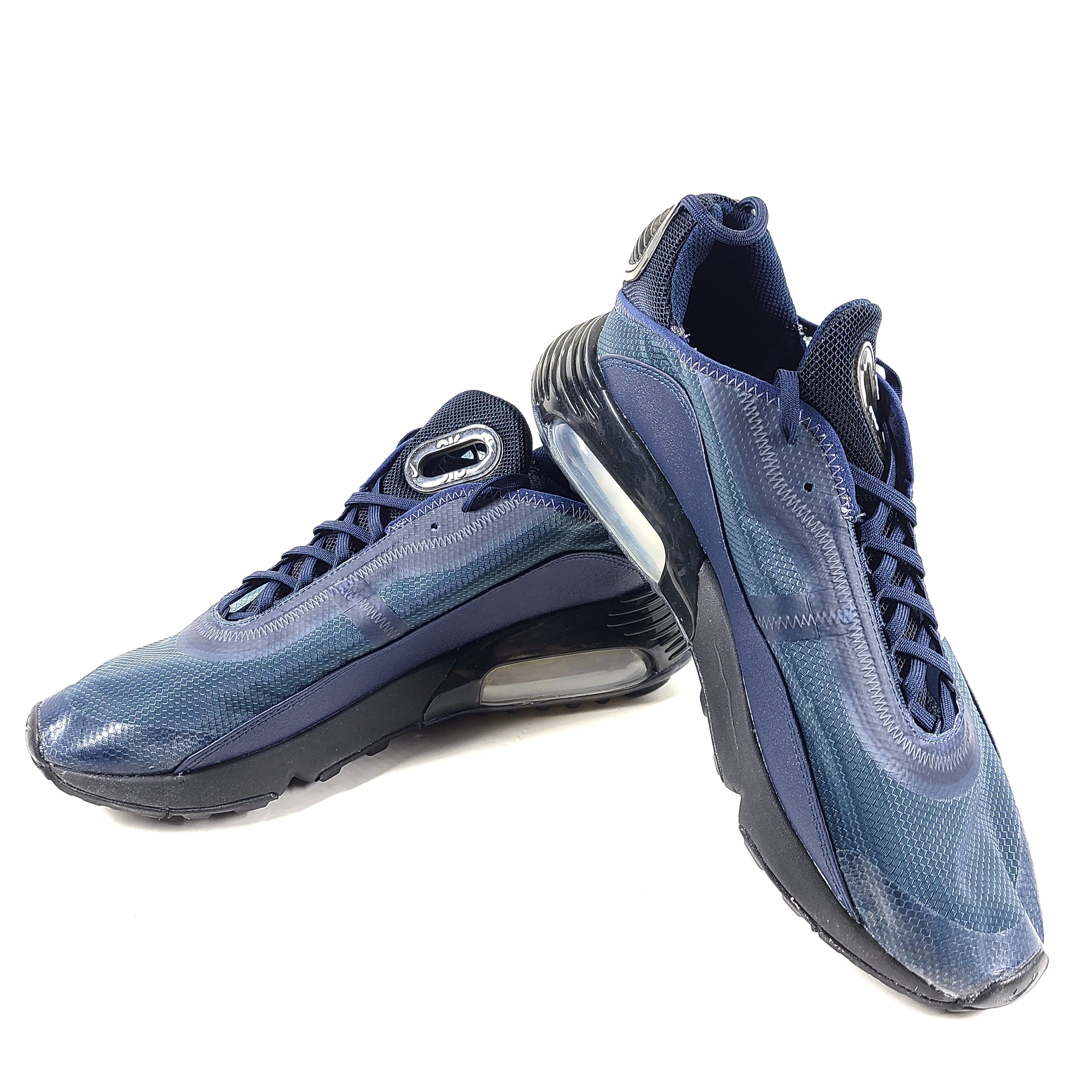 A pair of blue Nike Air Max 2090 sneakers