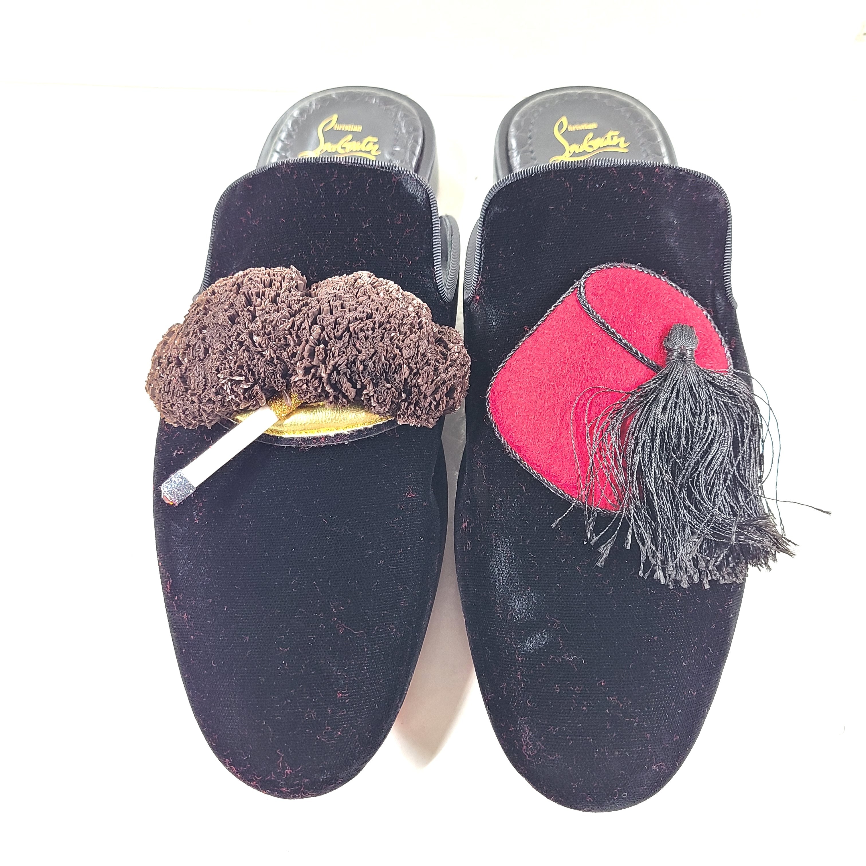 A pair of Christian Louboutin Black Velvet Tassel Slippers Size 41 for men