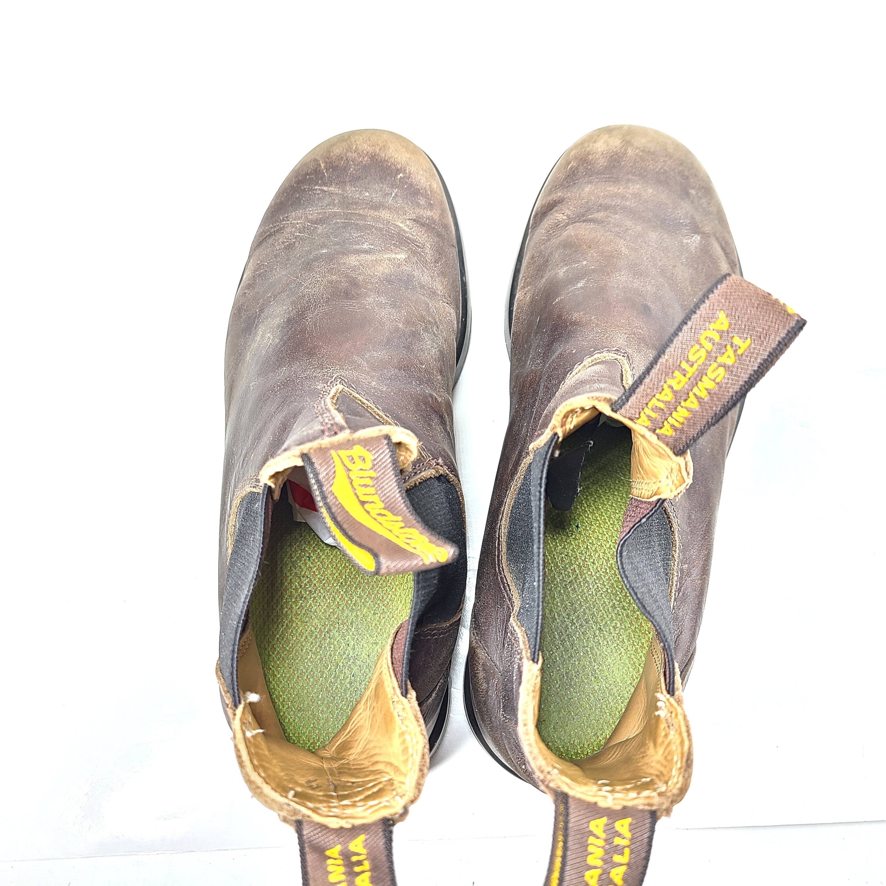 A pair of brown Blundstone leather boots