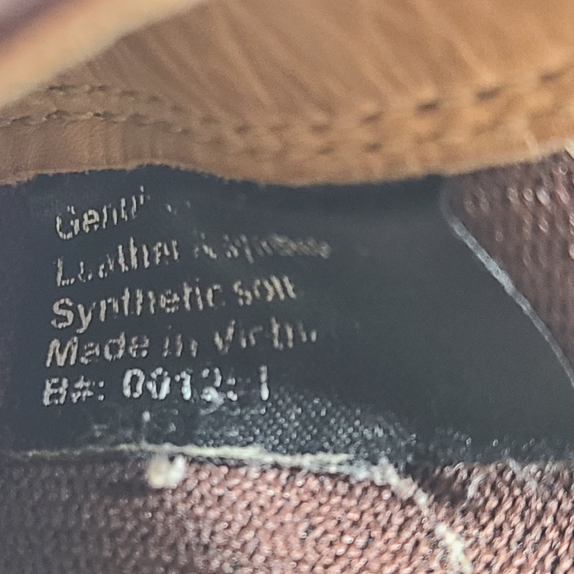 A pair of brown Blundstone leather boots