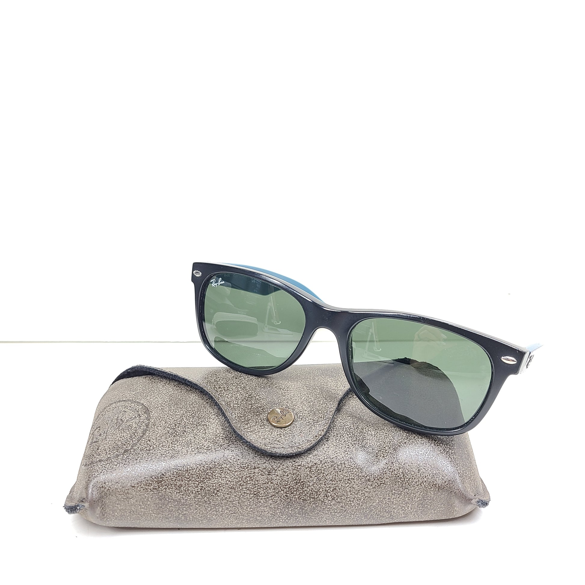 A stylish pair of Ray-Ban New Wayfarer Sunglasses from Italy