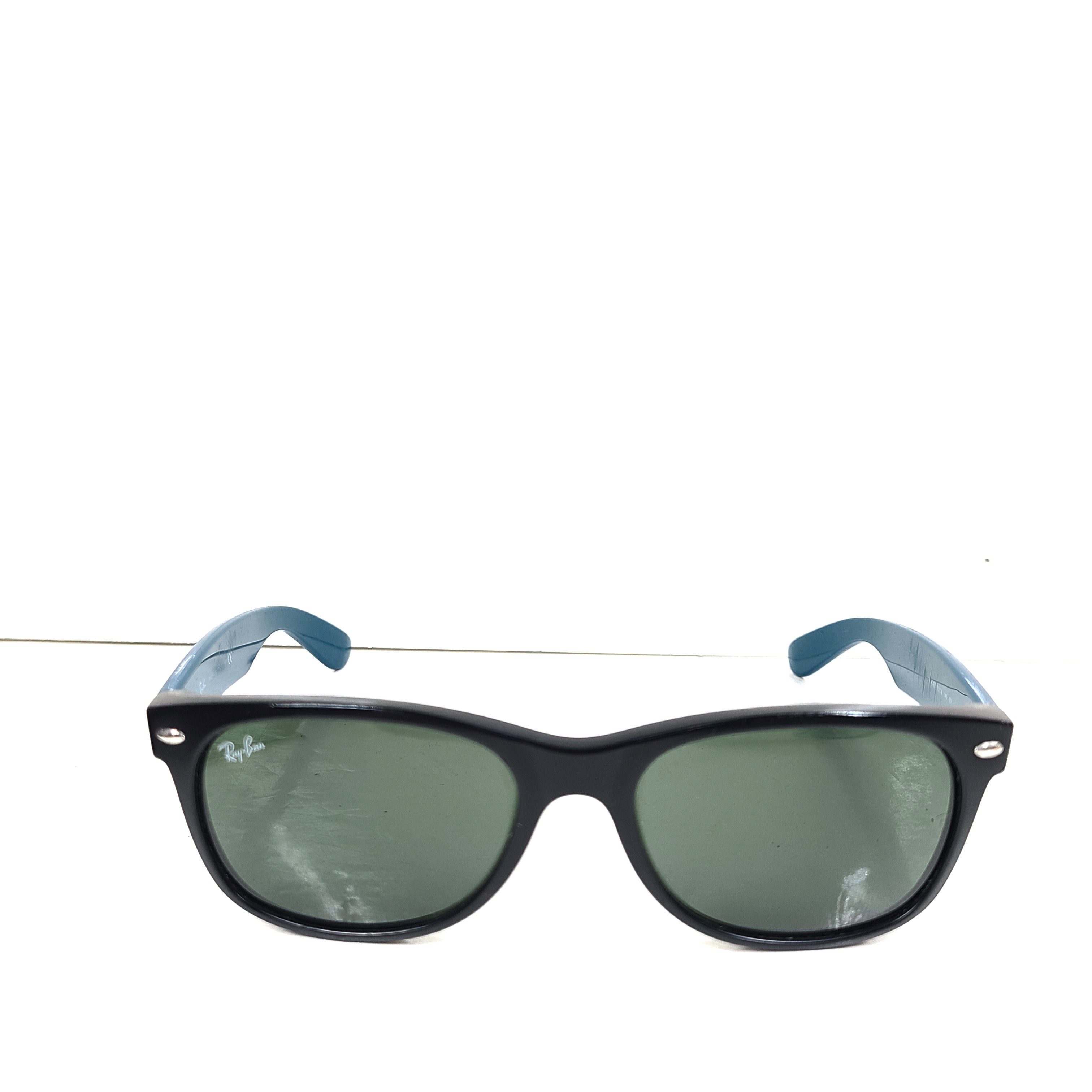A stylish pair of Ray-Ban New Wayfarer Sunglasses from Italy