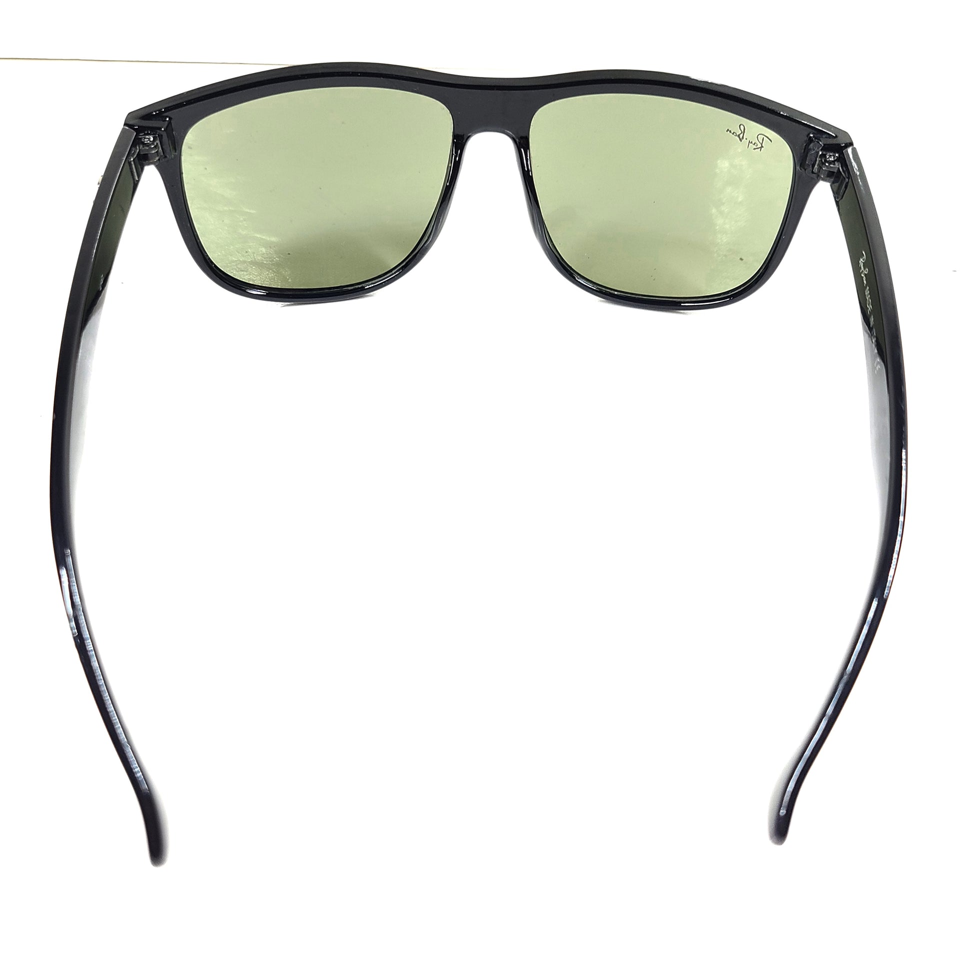 A pair of pre-owned black frame Ray-Ban sunglasses with green lenses for men